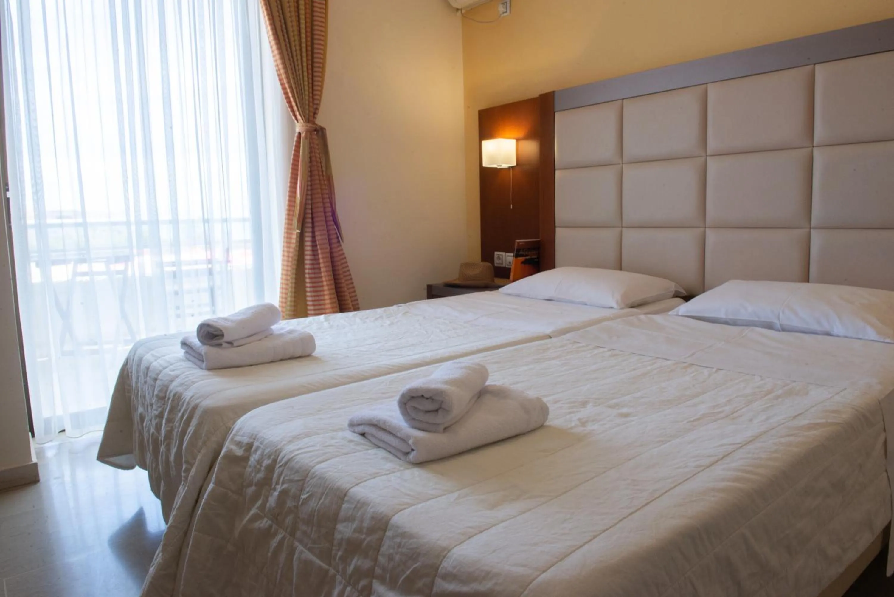 Bed in GOLDEN SUN Κokkoni Beach Hotel