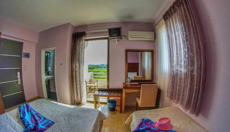 Bed in GOLDEN SUN Κokkoni Beach Hotel