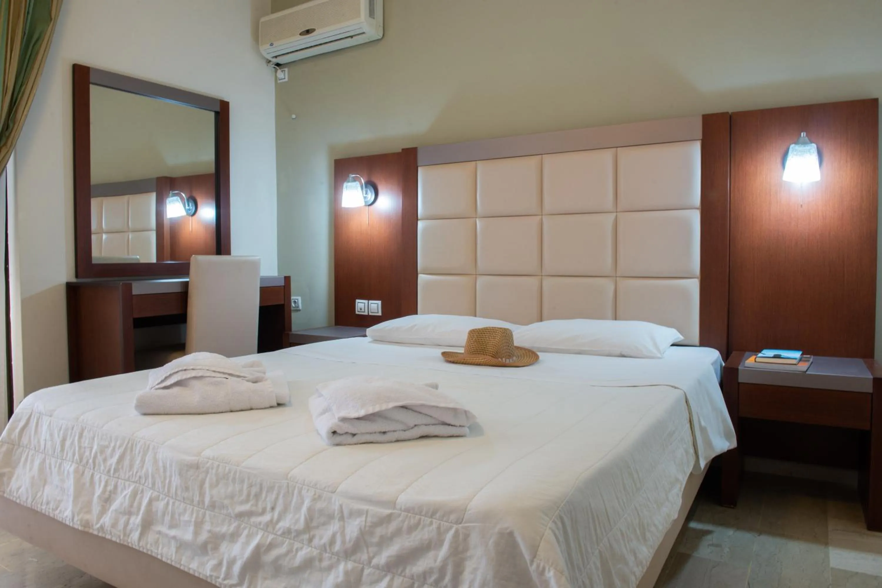 Bed in GOLDEN SUN Κokkoni Beach Hotel