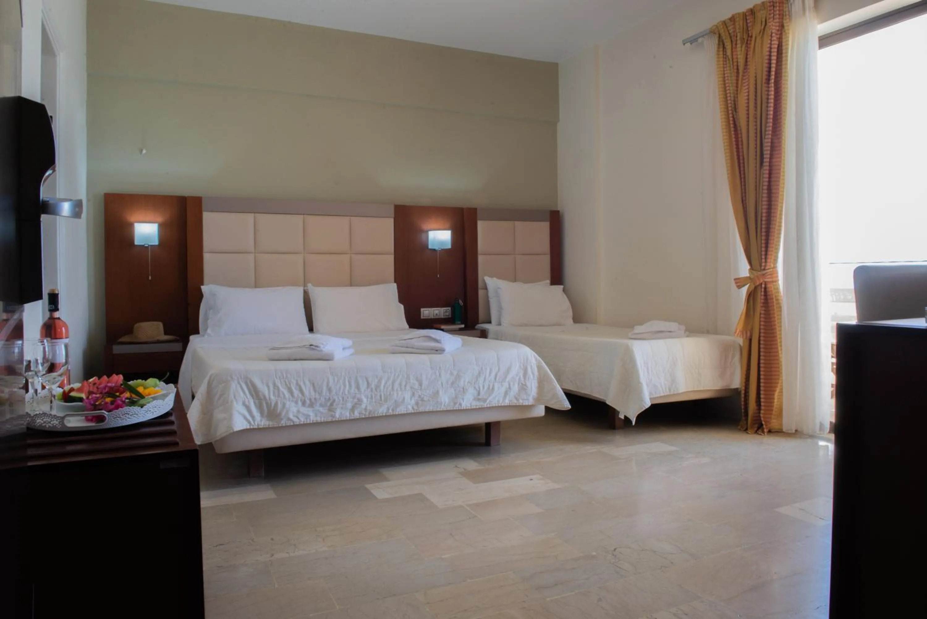 Bed in GOLDEN SUN Κokkoni Beach Hotel