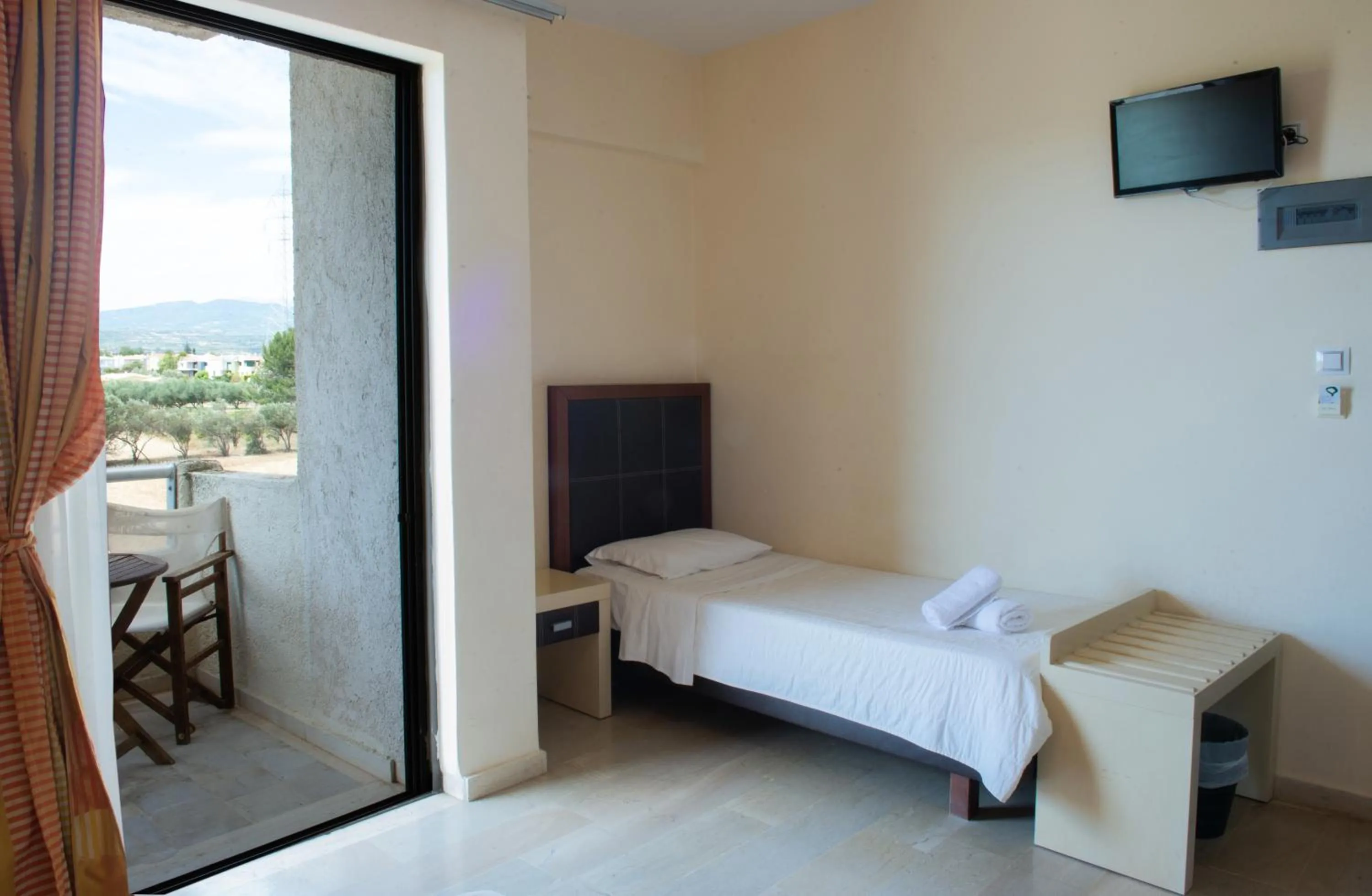 Bed in GOLDEN SUN Κokkoni Beach Hotel