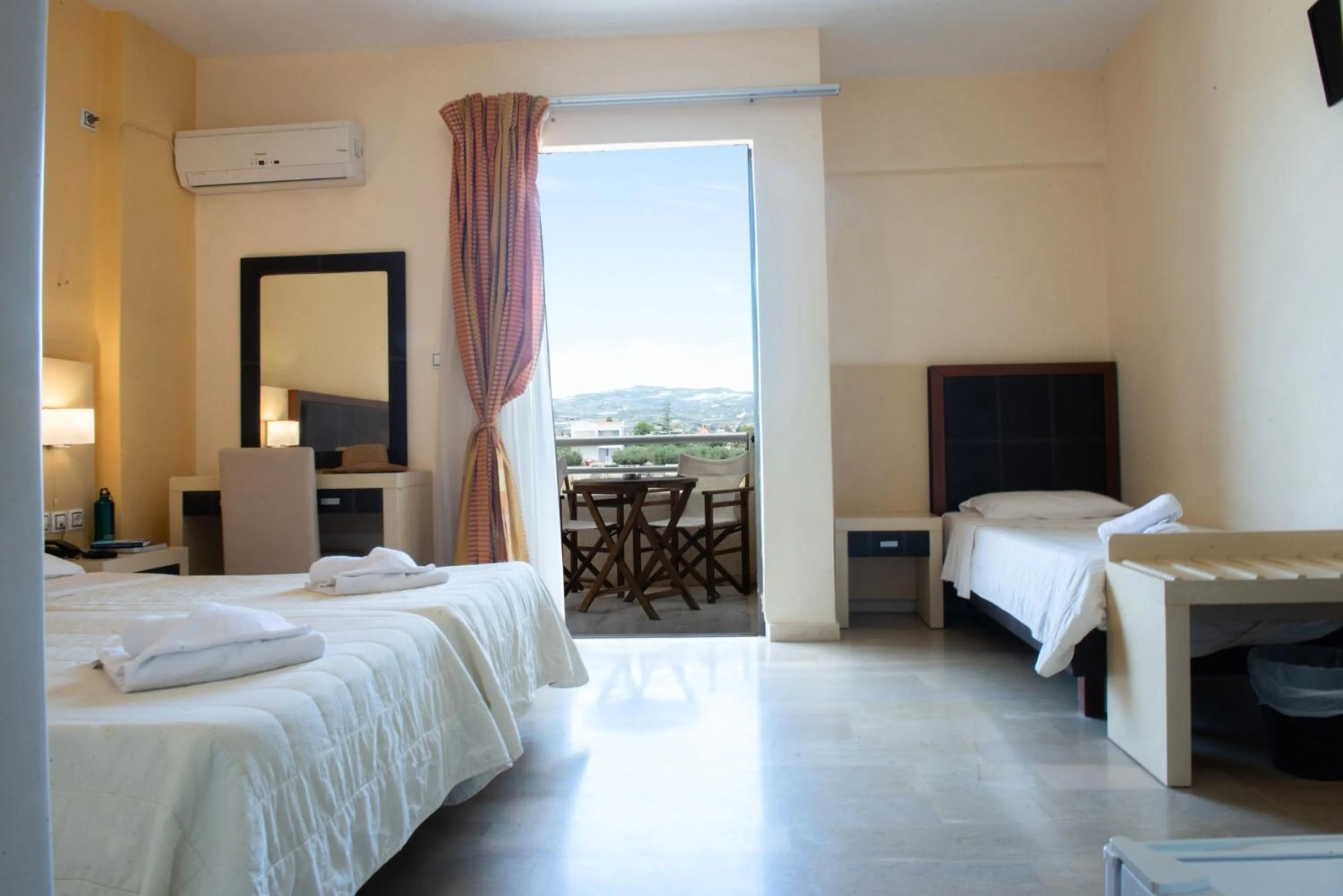 Bed in GOLDEN SUN Κokkoni Beach Hotel