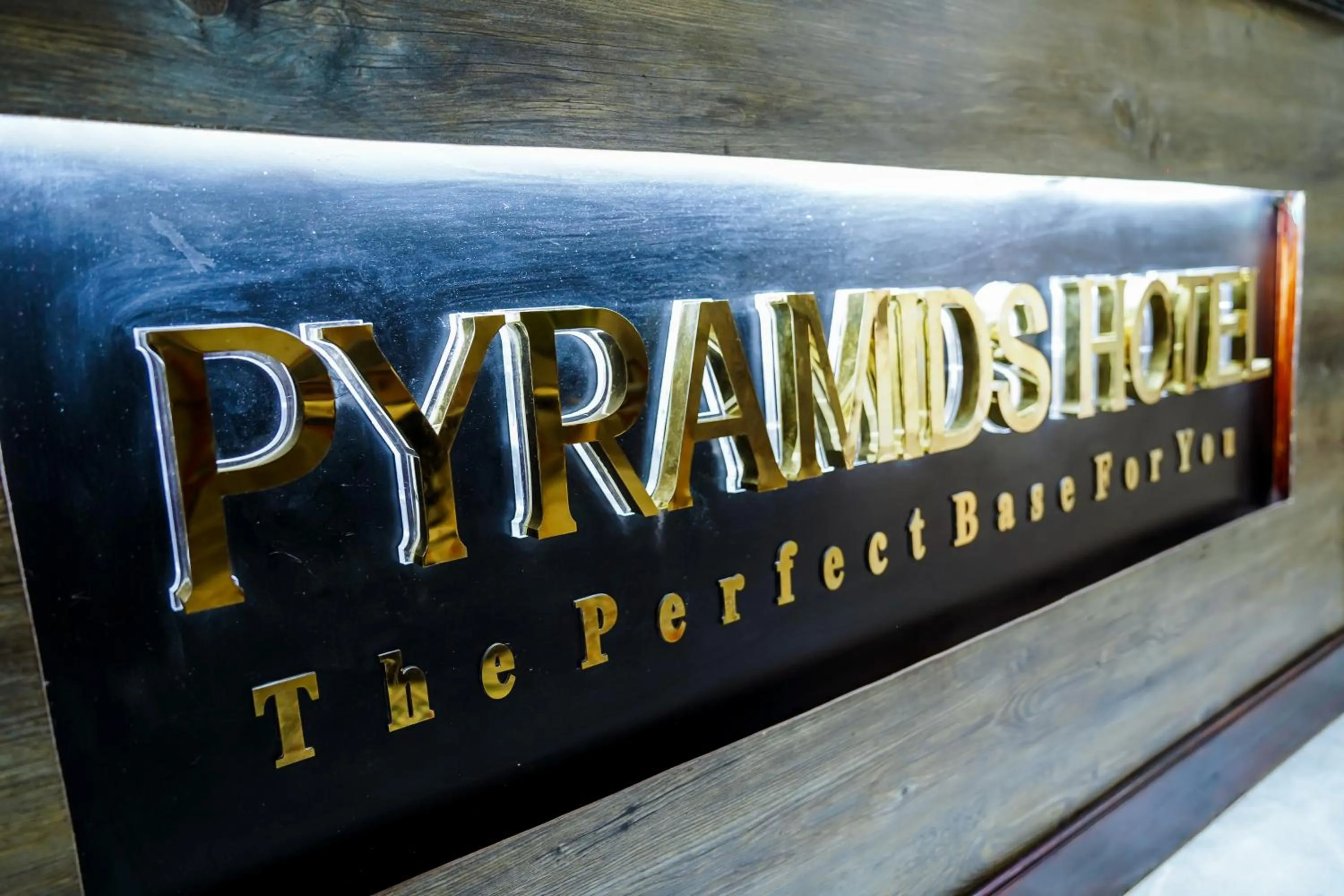 Property logo or sign in Pyramids Hotel