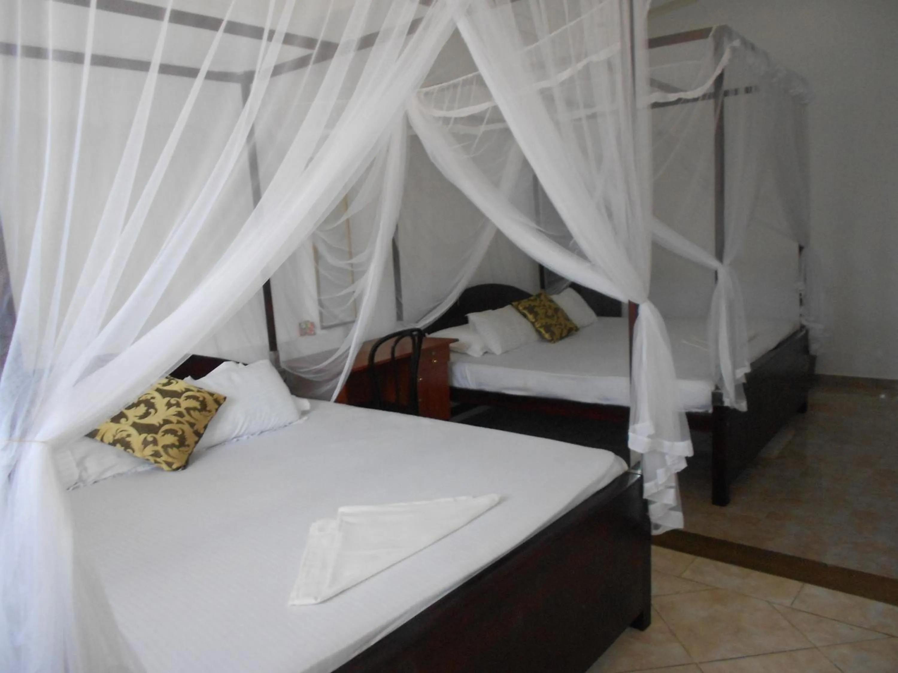 Bed in Wijenayake's - Beach Haven Guest House - Galle Fort