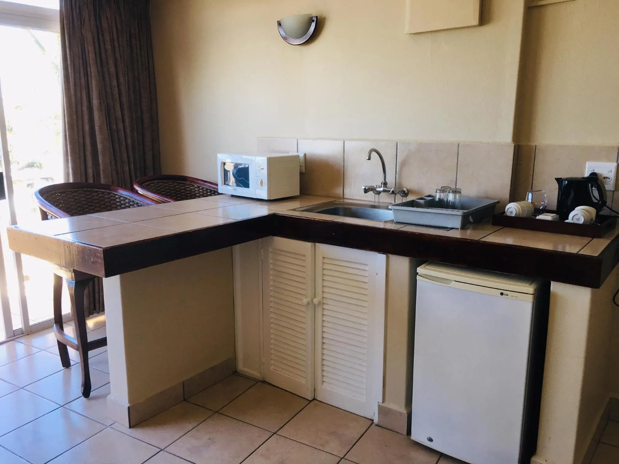 Kitchen or kitchenette in Salt Rock Hotel and Beach Resort