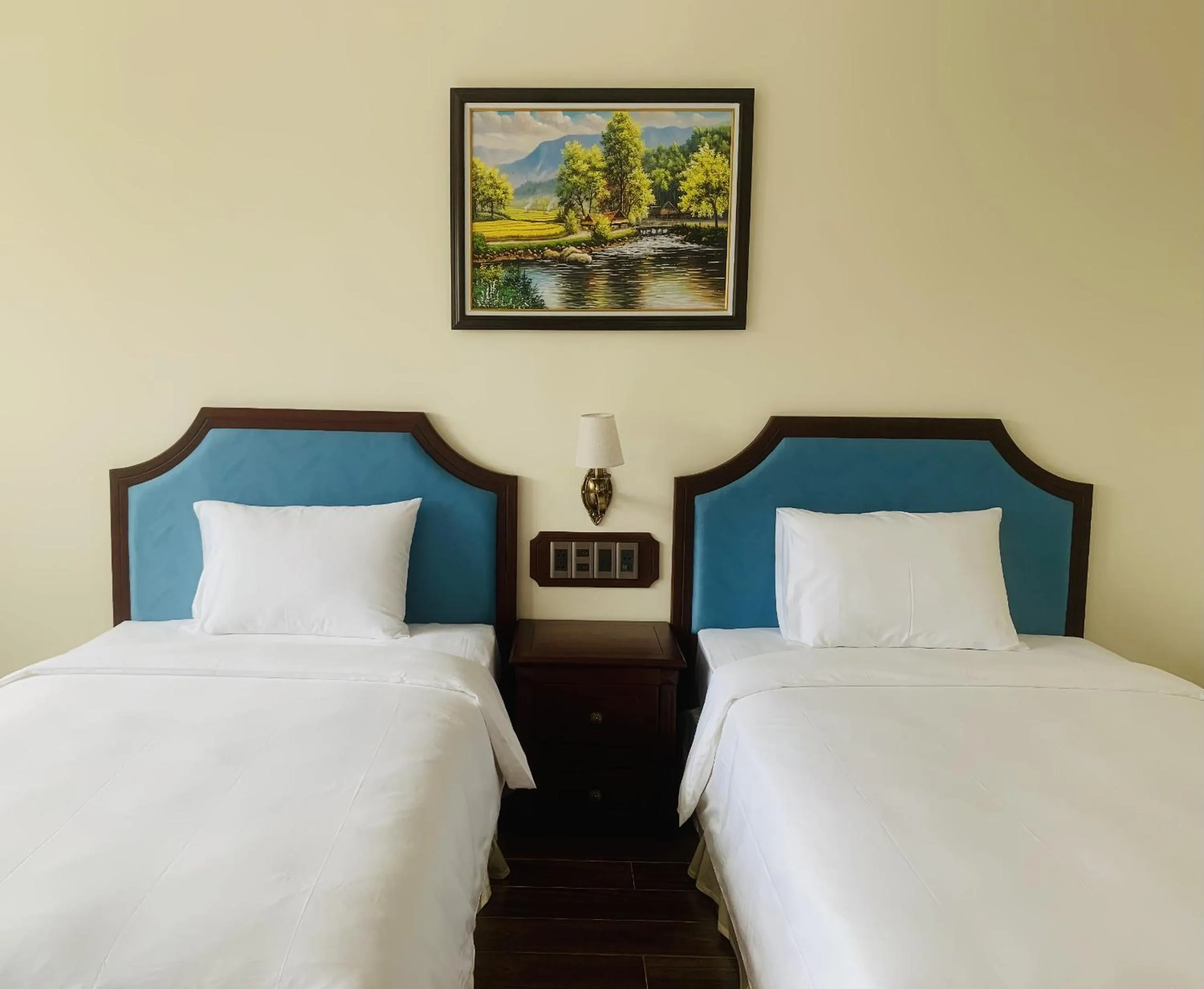 Bed in CALYSSA HOTELS & VILLAGE