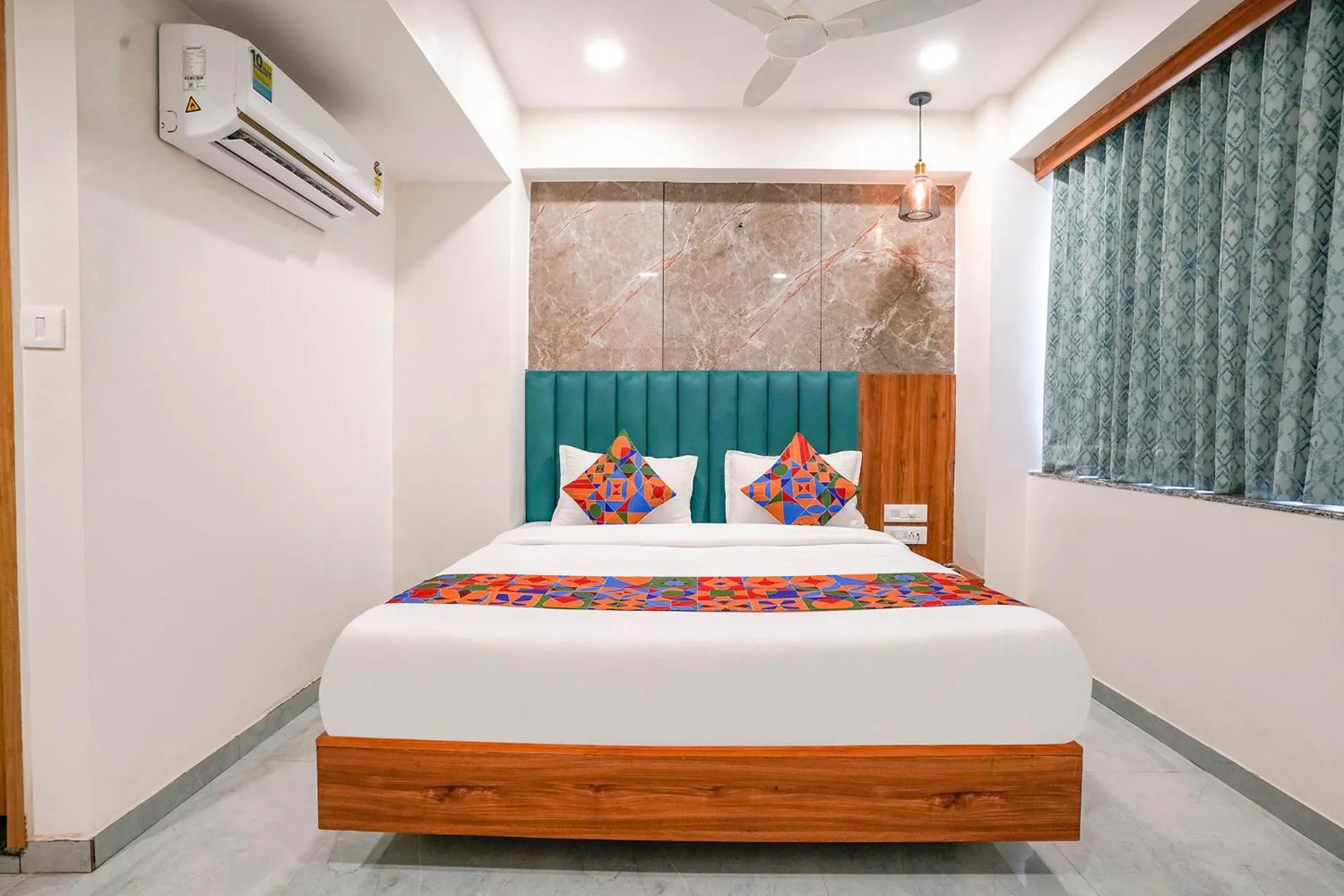 Bed in FabHotel Namantra - Nr Apollo Circle Sardar Patel Ring Road