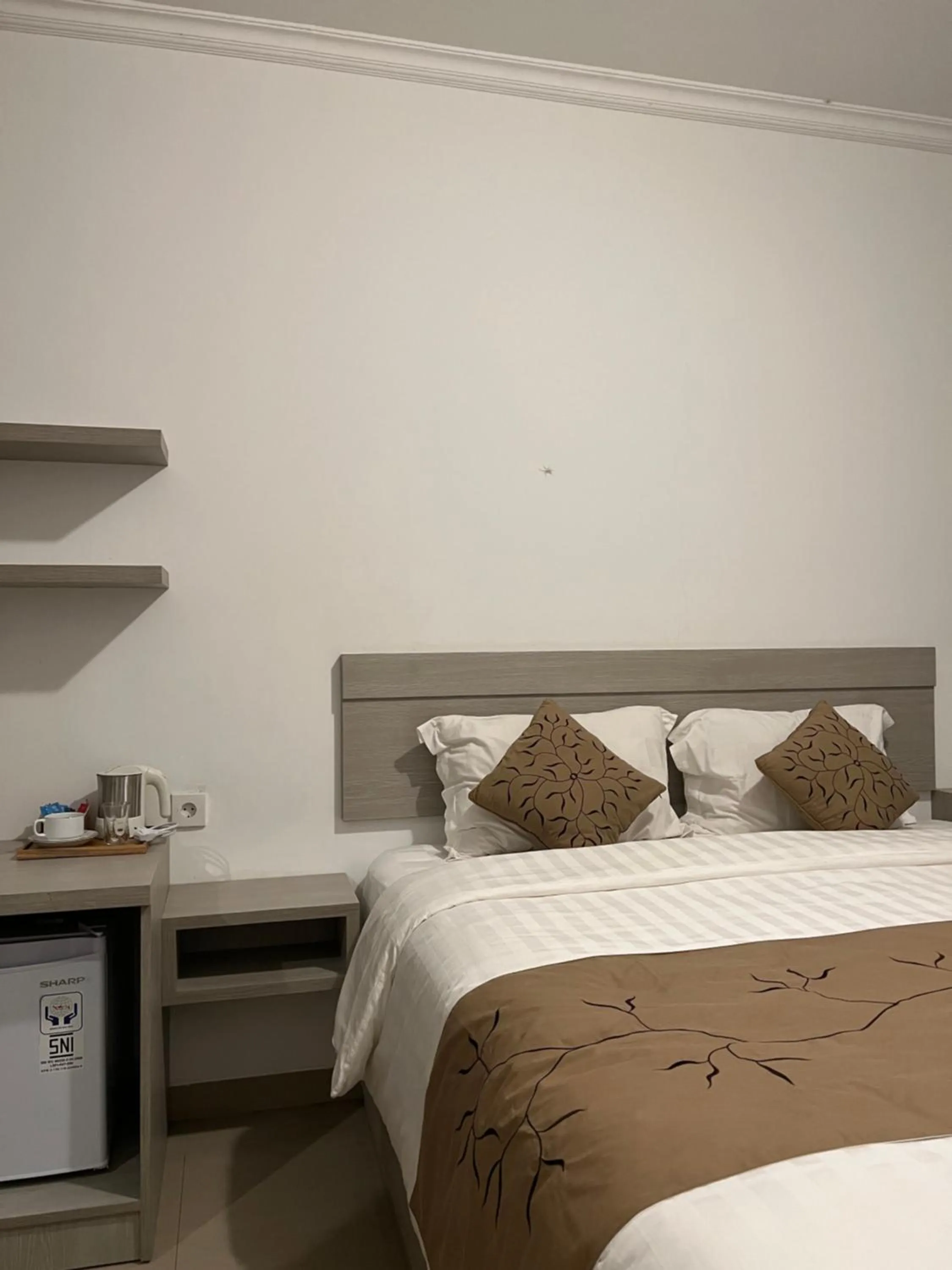 Bed in New W Guest House