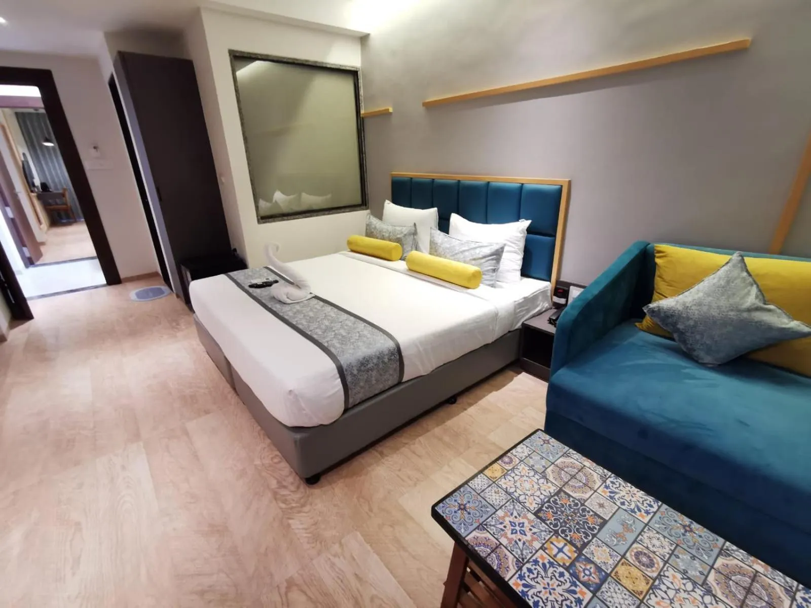 Seating area, Bed in Hotel The Excellency