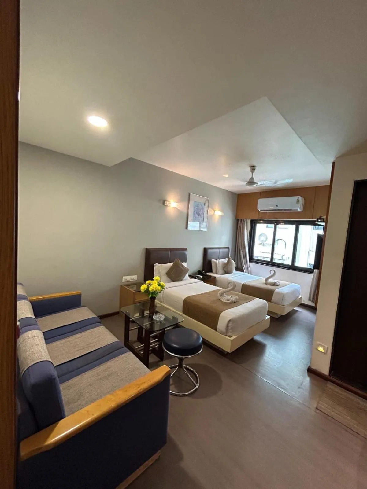 Seating area, Bed in Hotel The Excellency