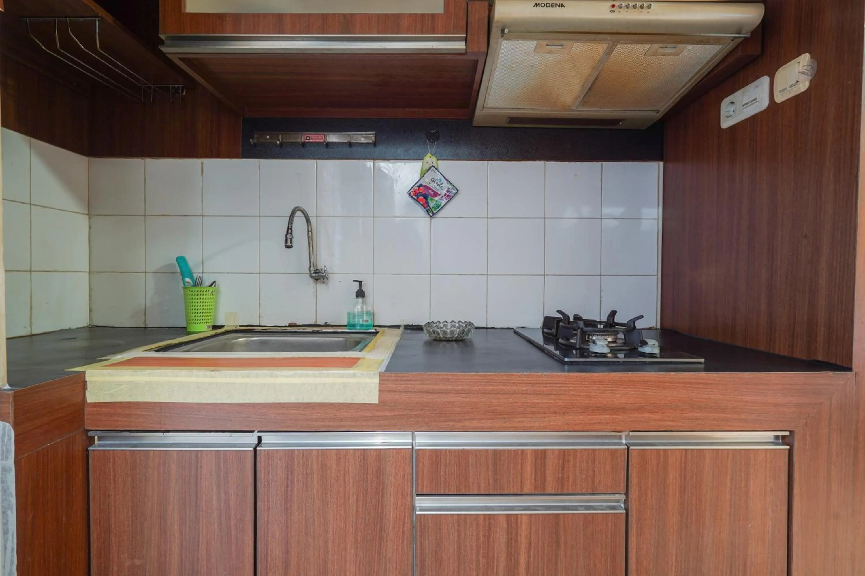 Bedroom in OYO 93545 Gateway Cicadas Apartment By Barbie Homestay