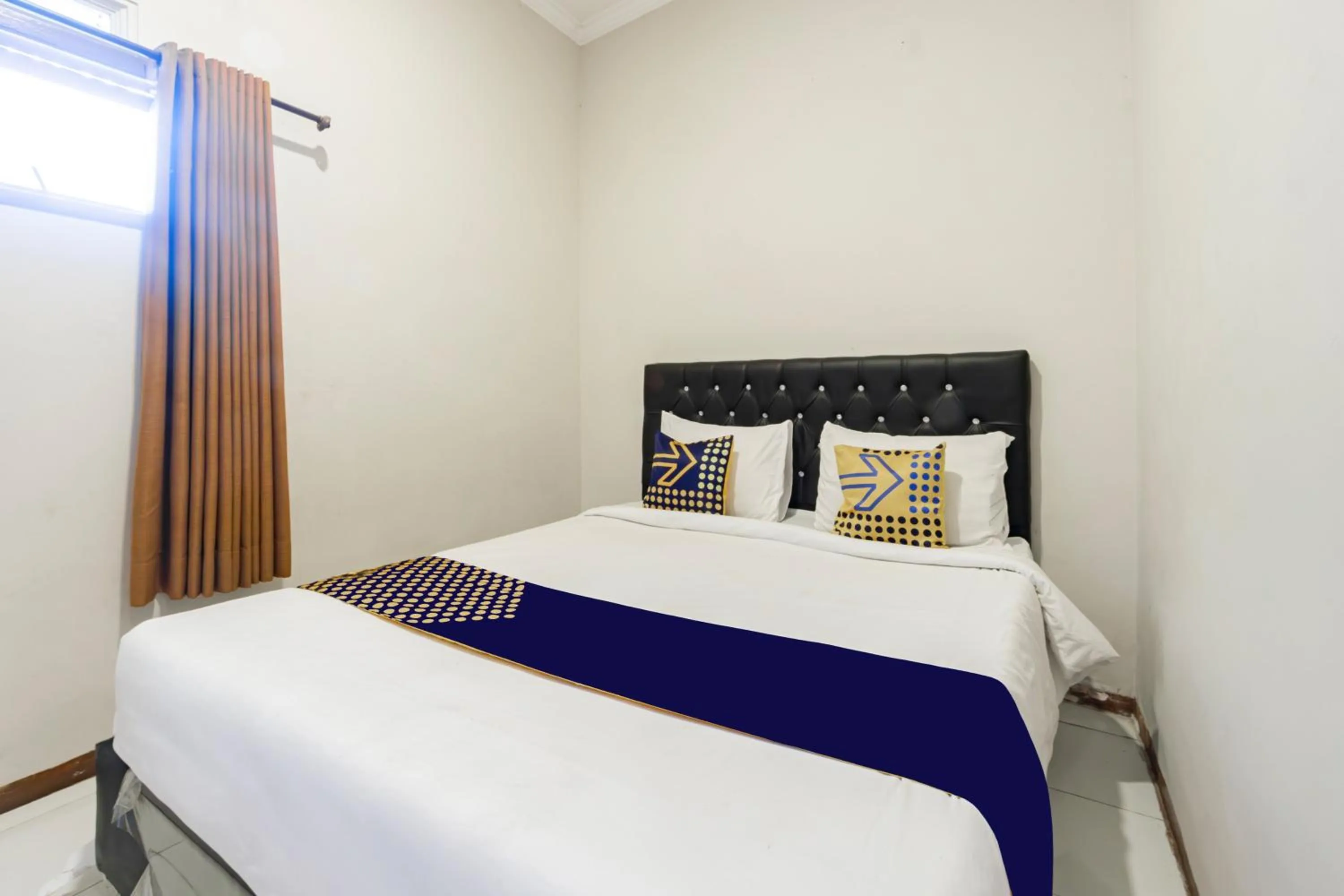 Bedroom, Bed in Hotel O Triple N Homestay