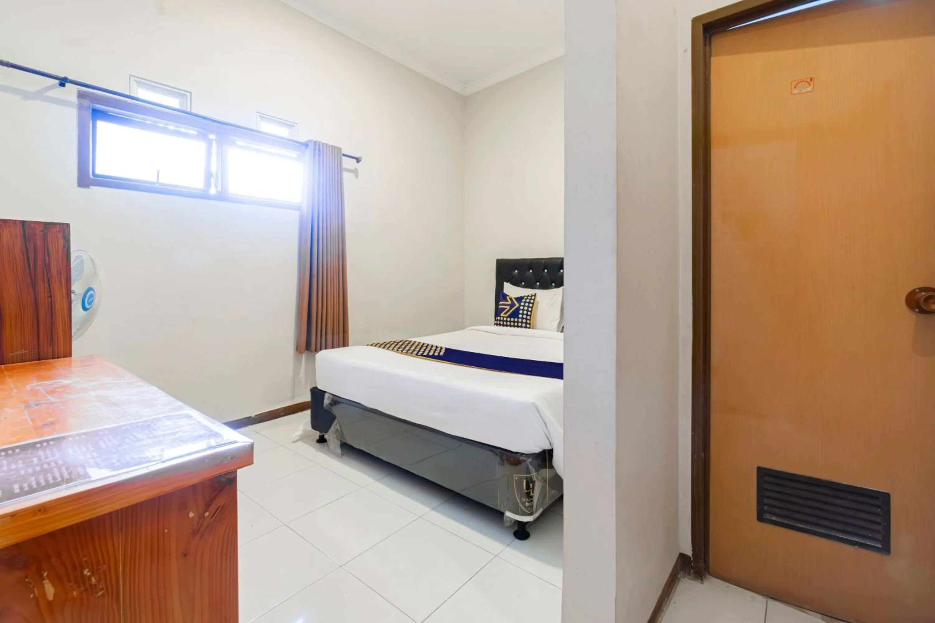 Bedroom, Bed in Hotel O Triple N Homestay