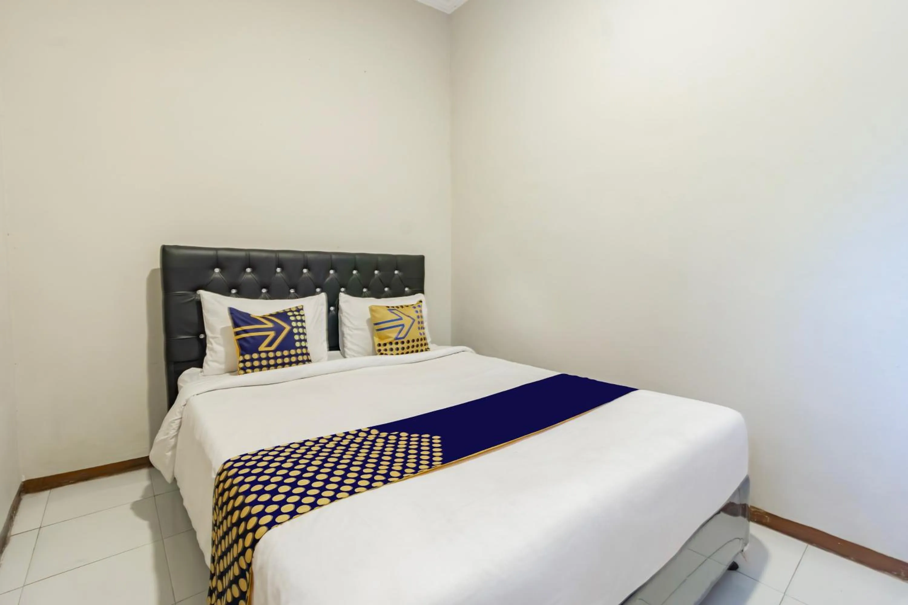 Bedroom, Bed in Hotel O Triple N Homestay