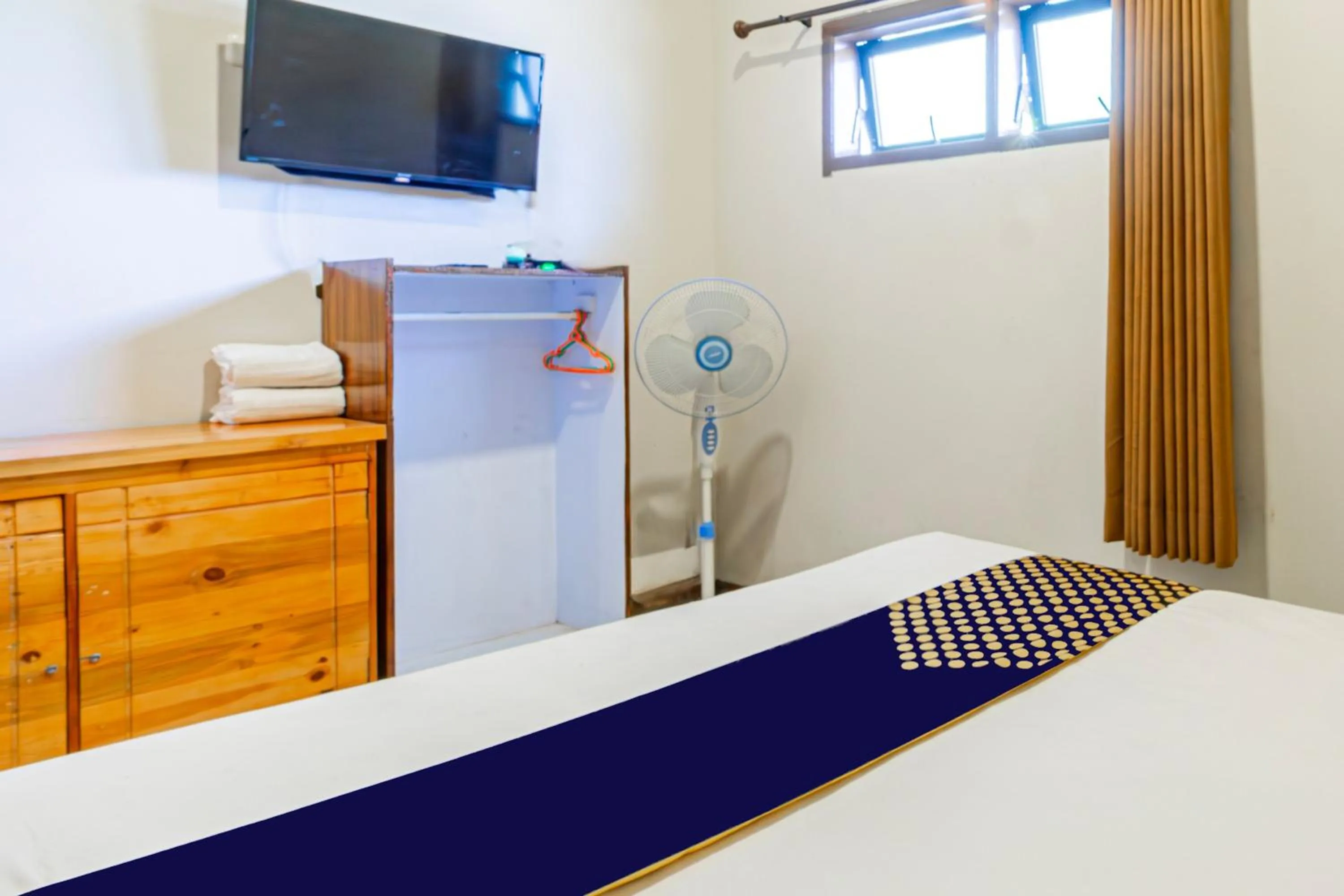 Bedroom, Bed in Hotel O Triple N Homestay