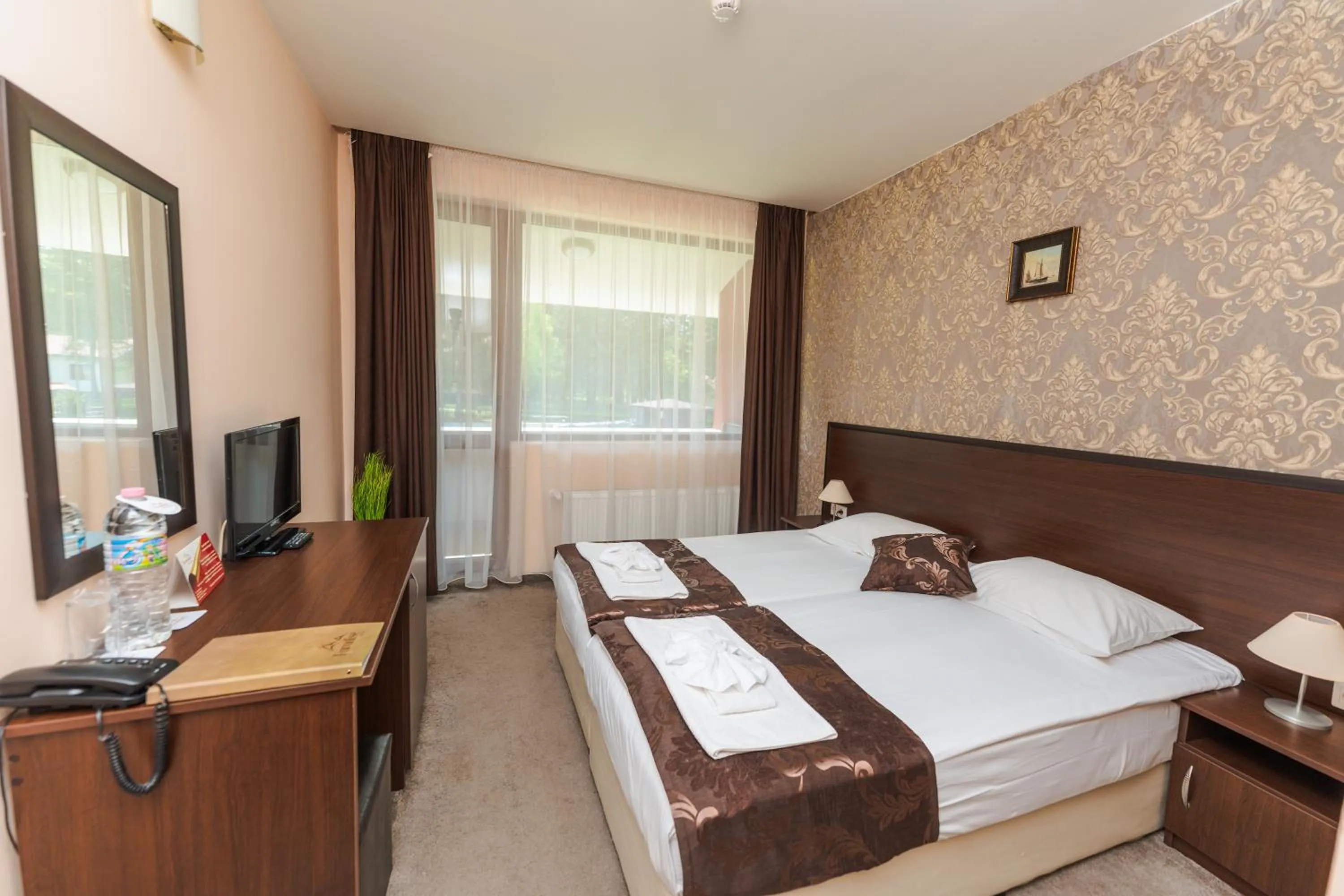 Patio, Bed in Paradise SPA Hotel