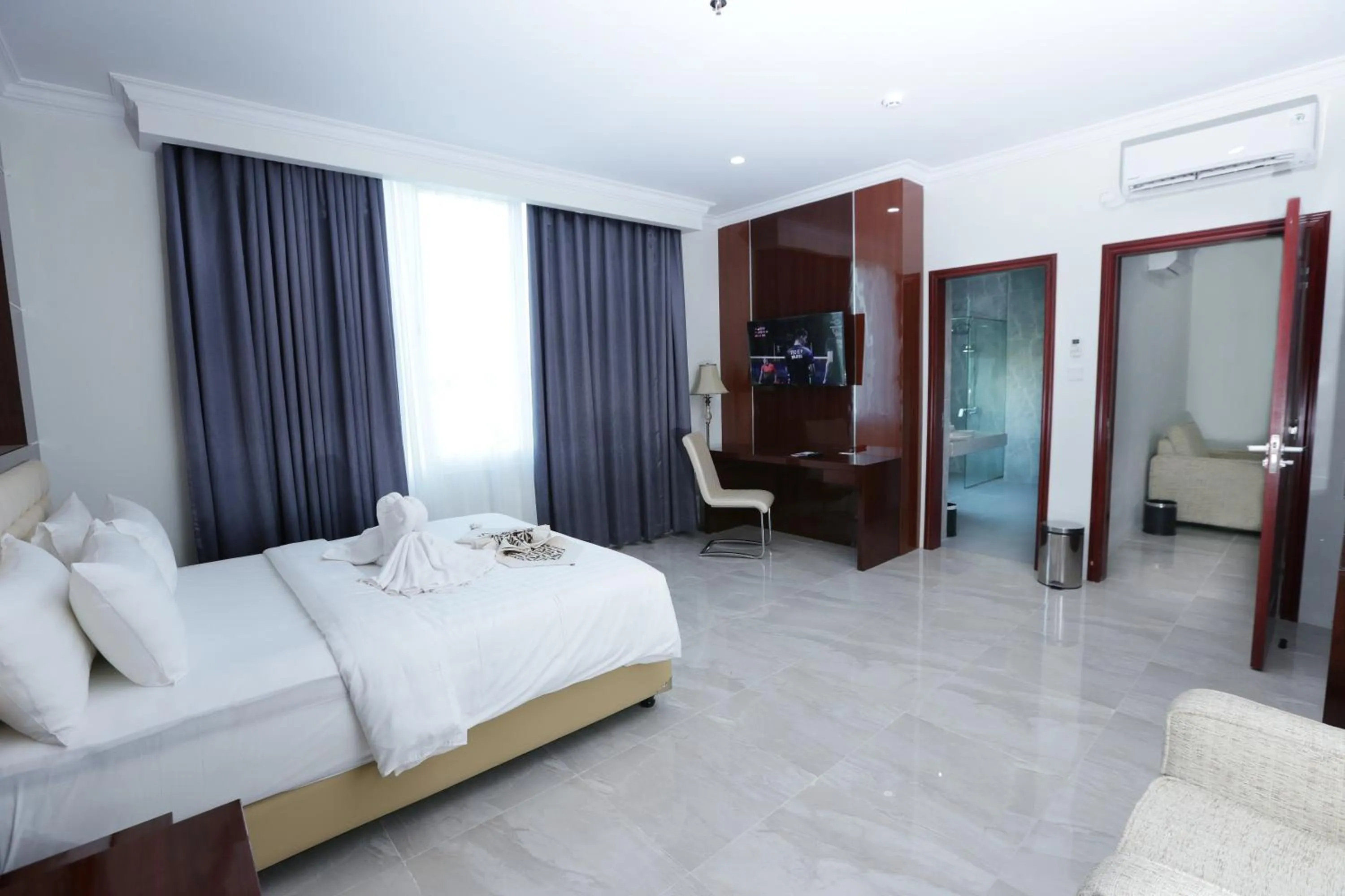 Bedroom in Sindoro Hotel Cilacap By Conary