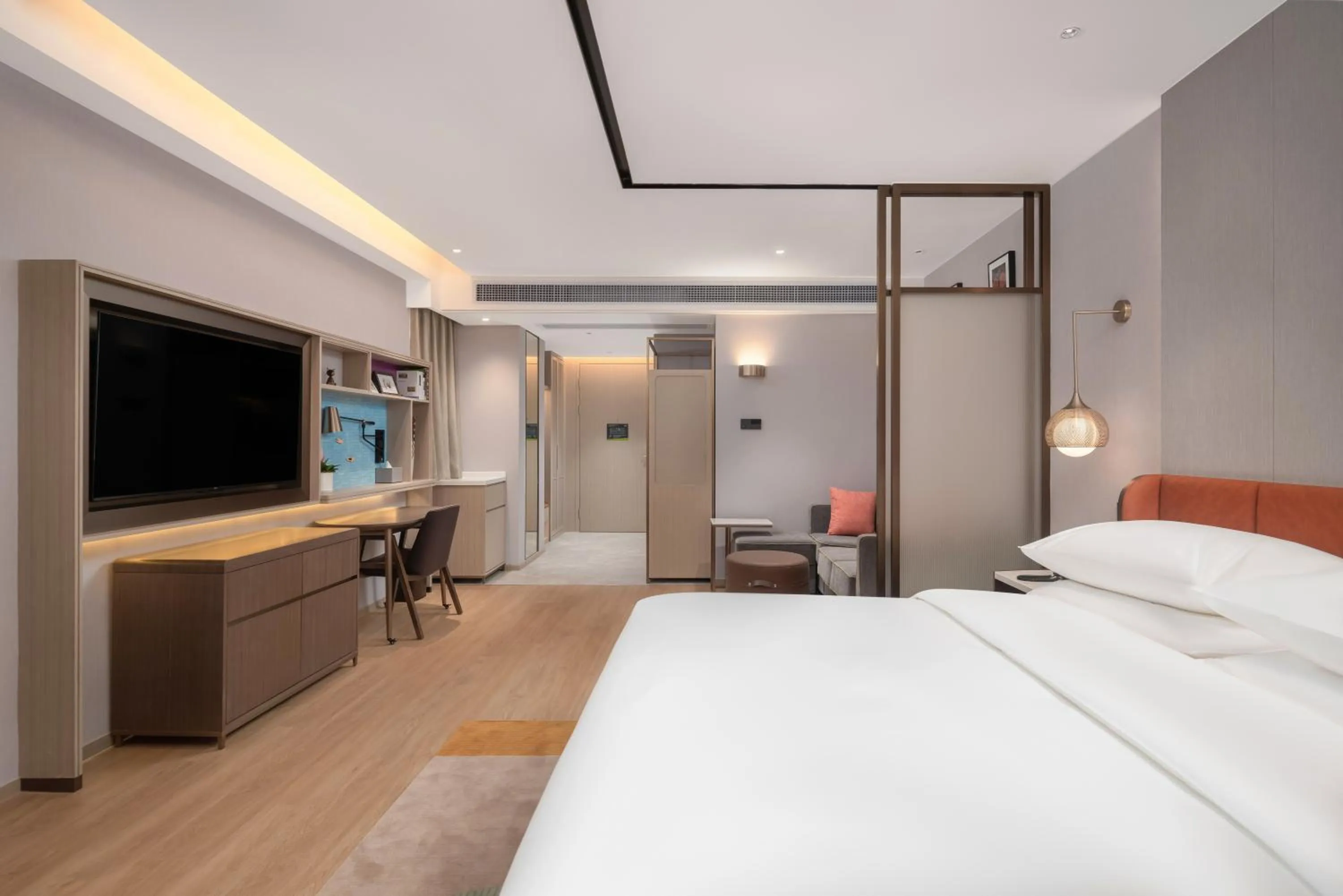 Bed in Home2 Suite by Hilton Dongguan Shijie