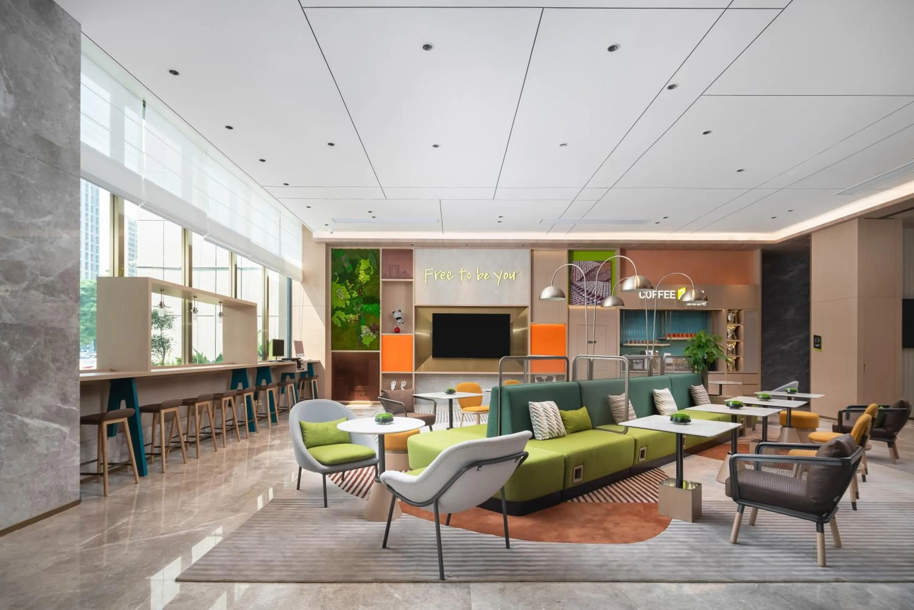 Communal lounge/ TV room in Home2 Suite by Hilton Dongguan Shijie