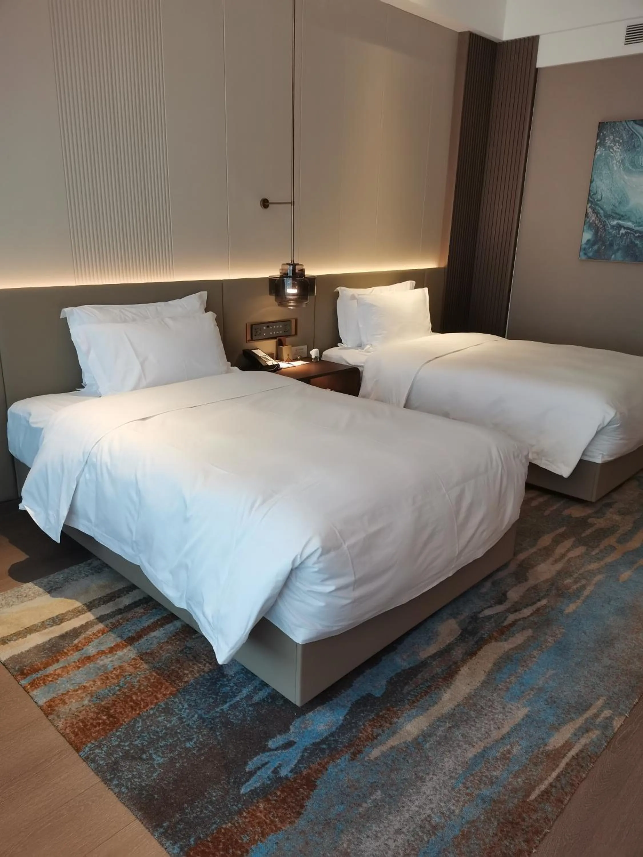 Bed in Wyndham Dalian Jinpu