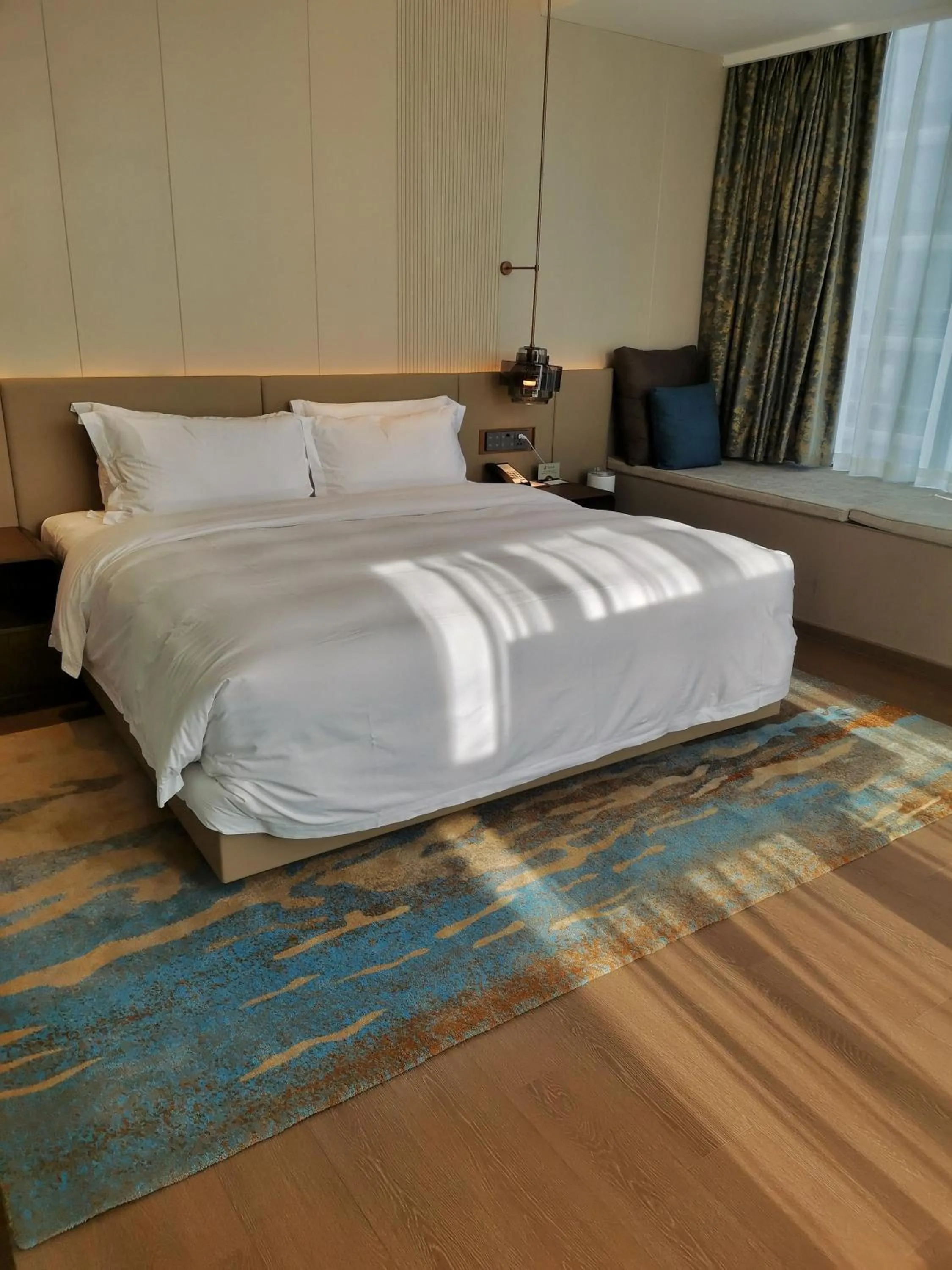 Bed in Wyndham Dalian Jinpu