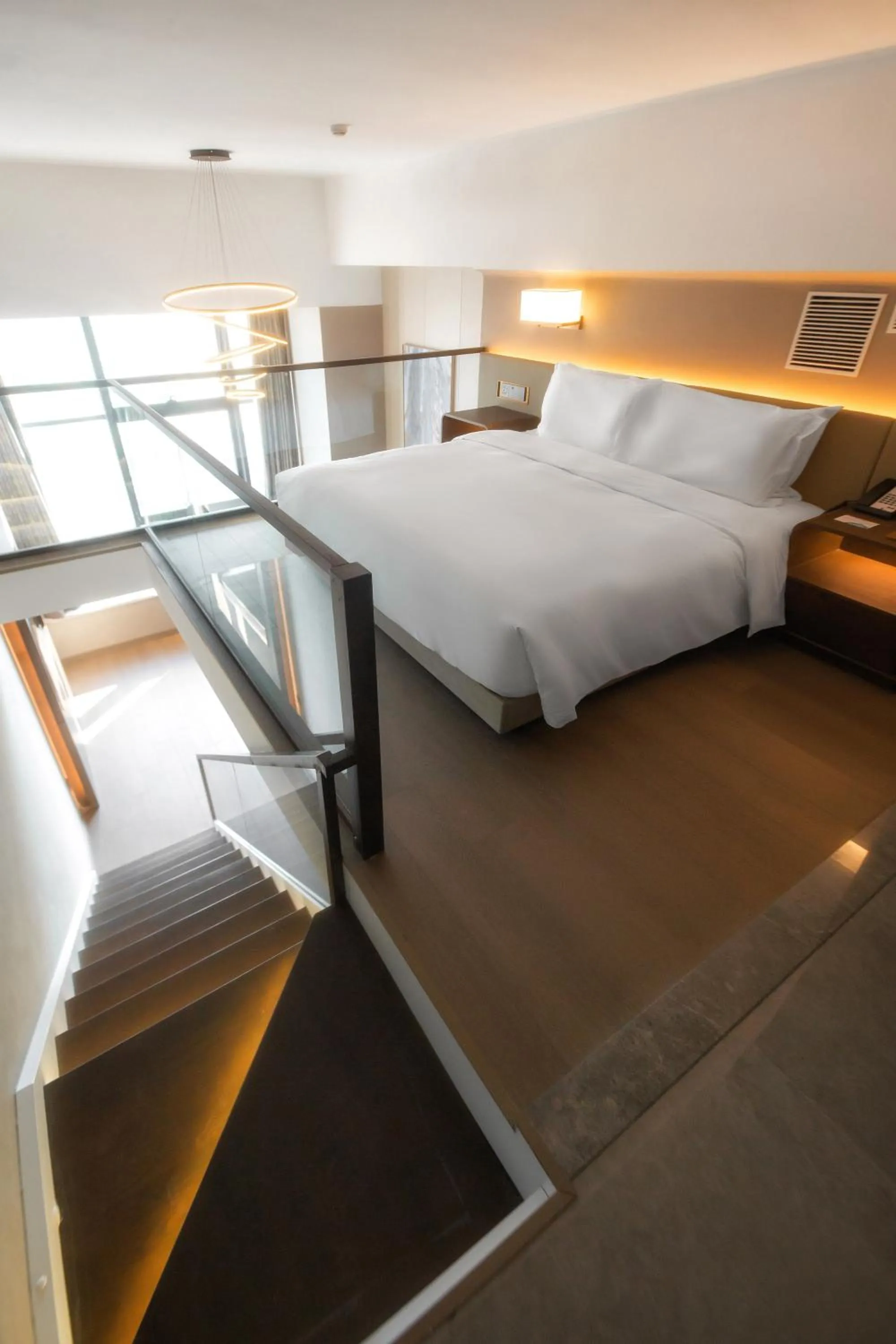 Bed in Wyndham Dalian Jinpu