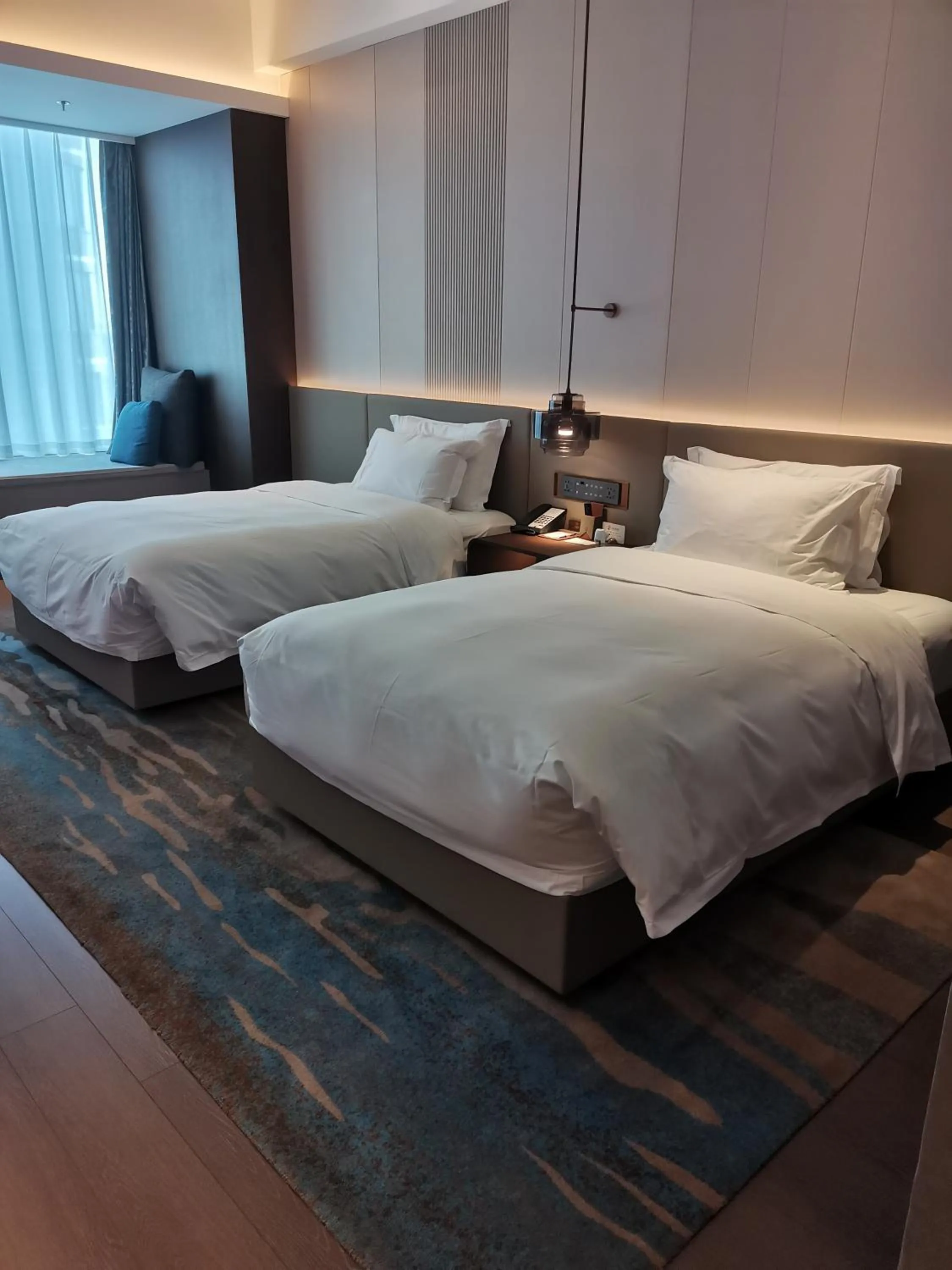 Bed in Wyndham Dalian Jinpu