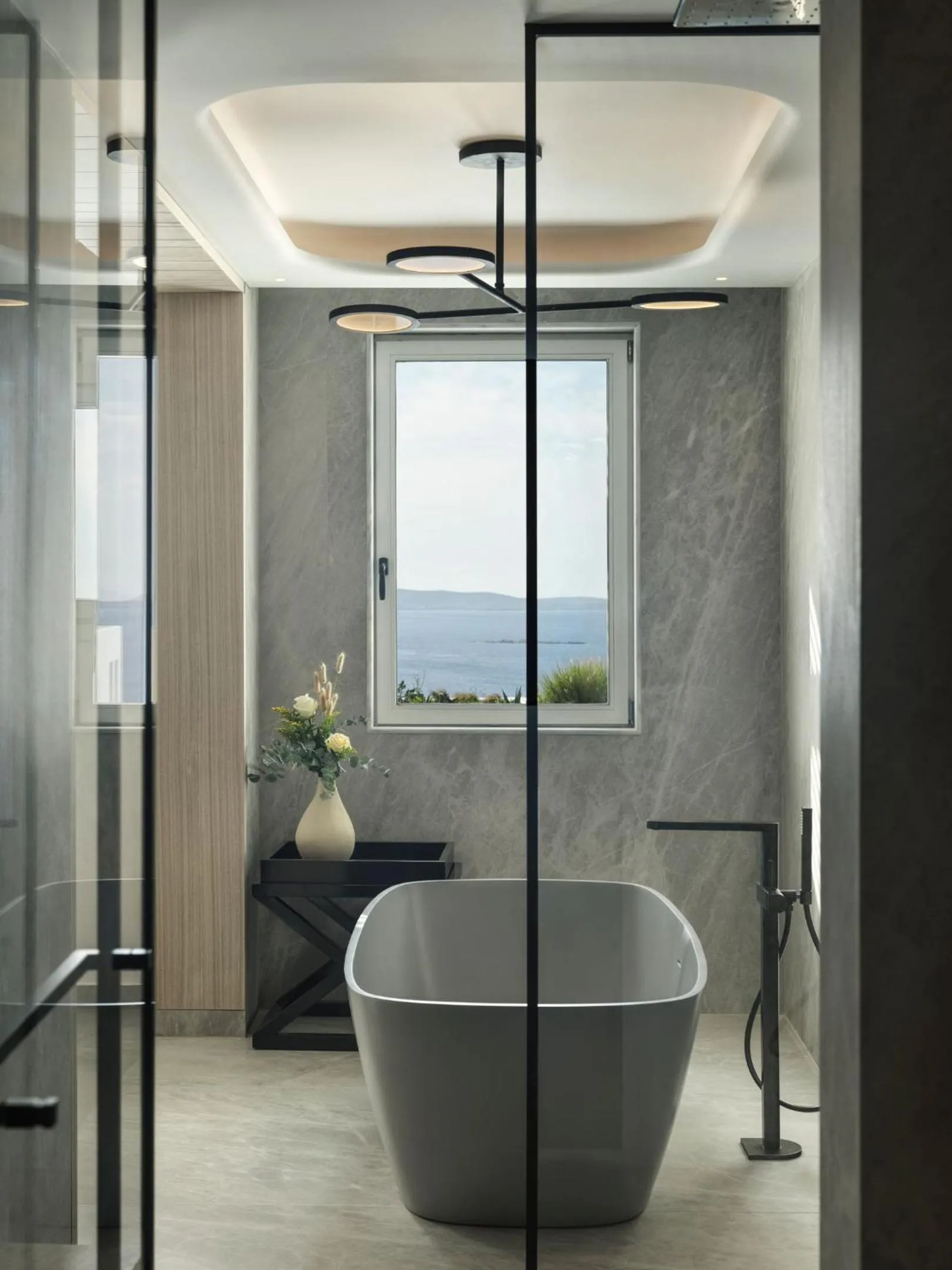 Bathroom in Deos Mykonos - A Myconian Collection Hotel