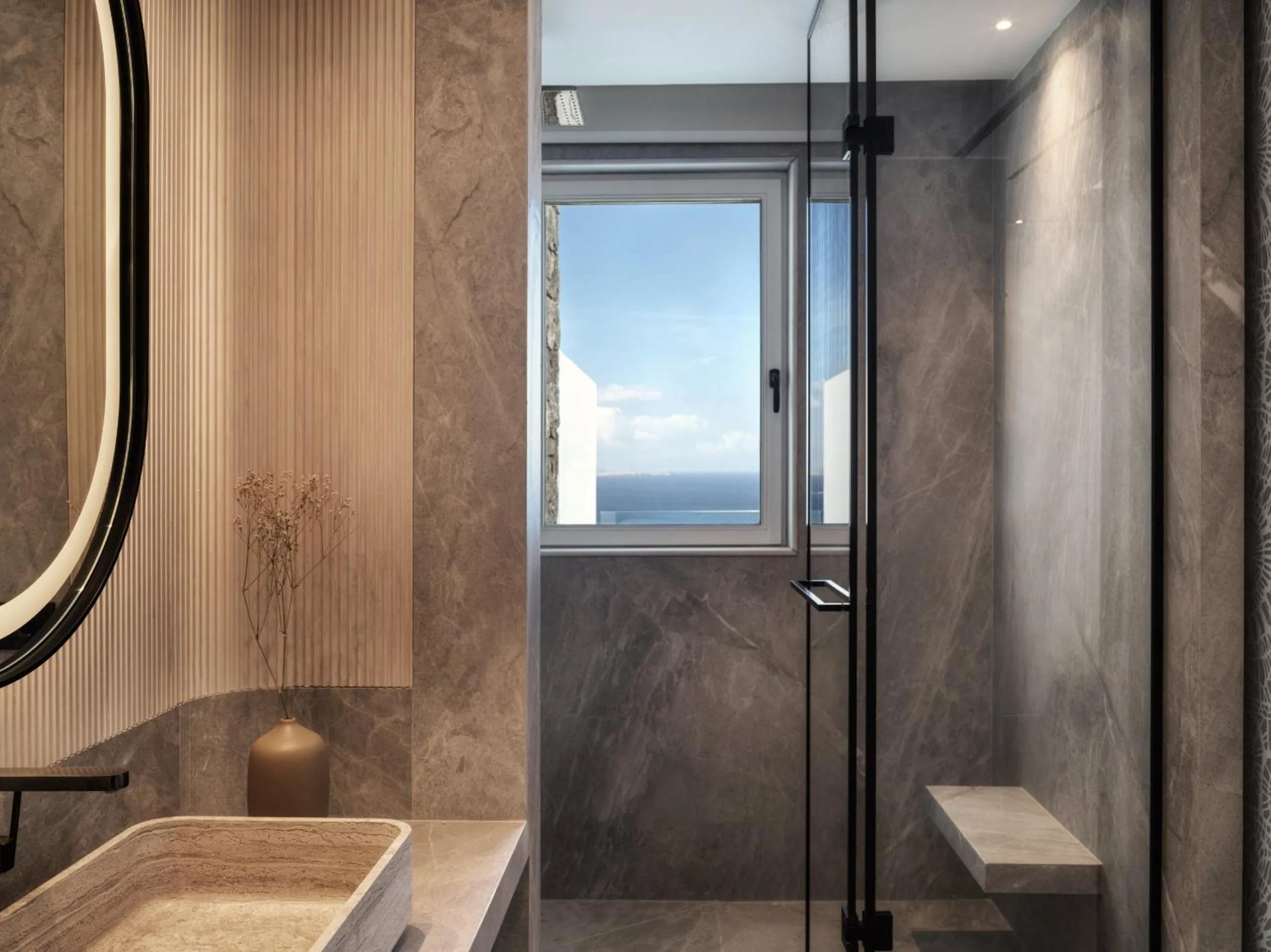 Shower in Deos Mykonos - A Myconian Collection Hotel