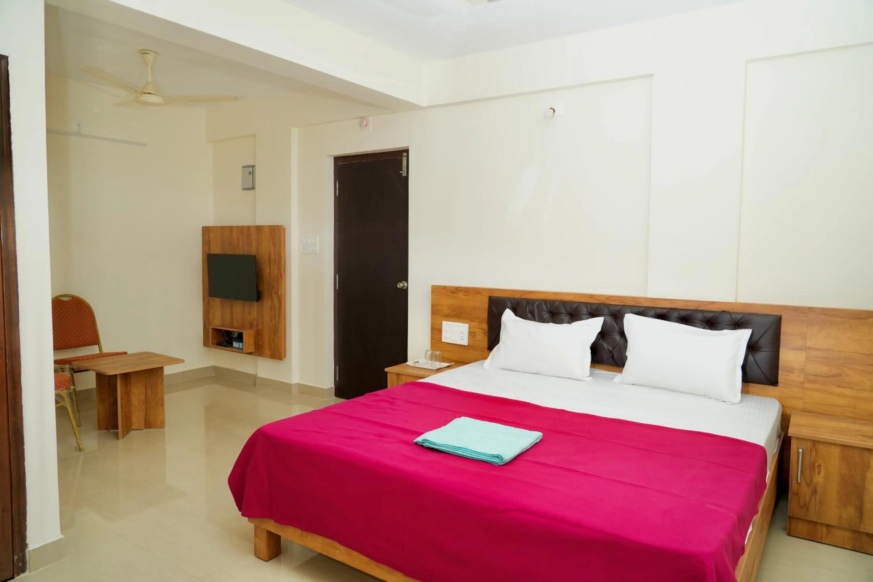 Bedroom, Bed in Shree Swarna Comforts