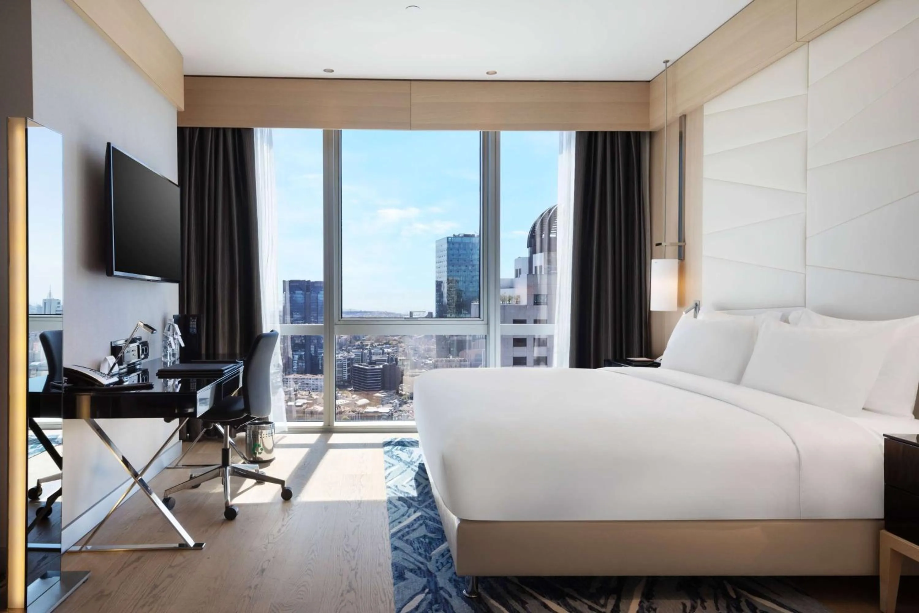 Photo of the whole room, Bed in Wyndham Grand Istanbul Levent Hotel & Conference Center