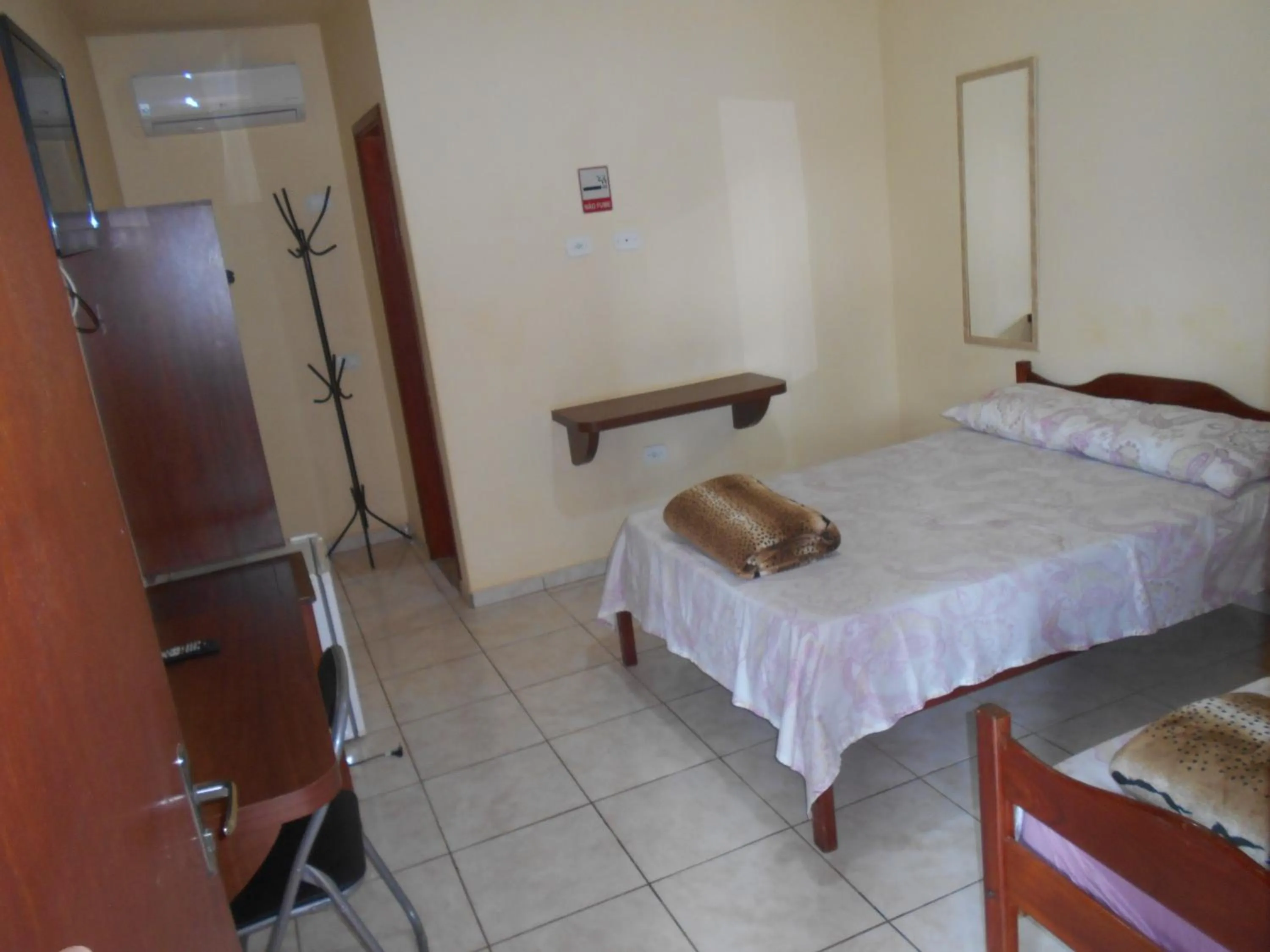 Bed in Pousada Paraiso