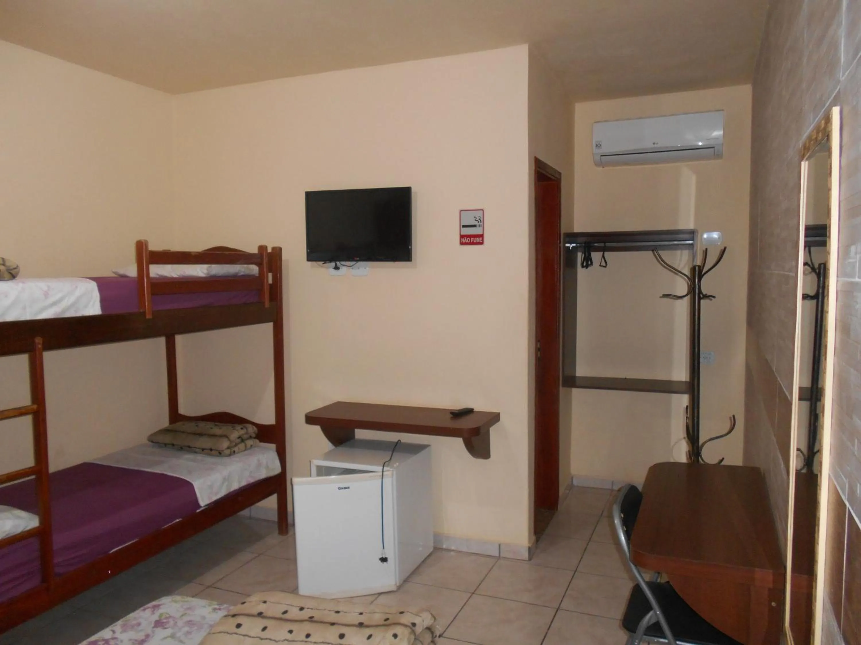 Bed in Pousada Paraiso