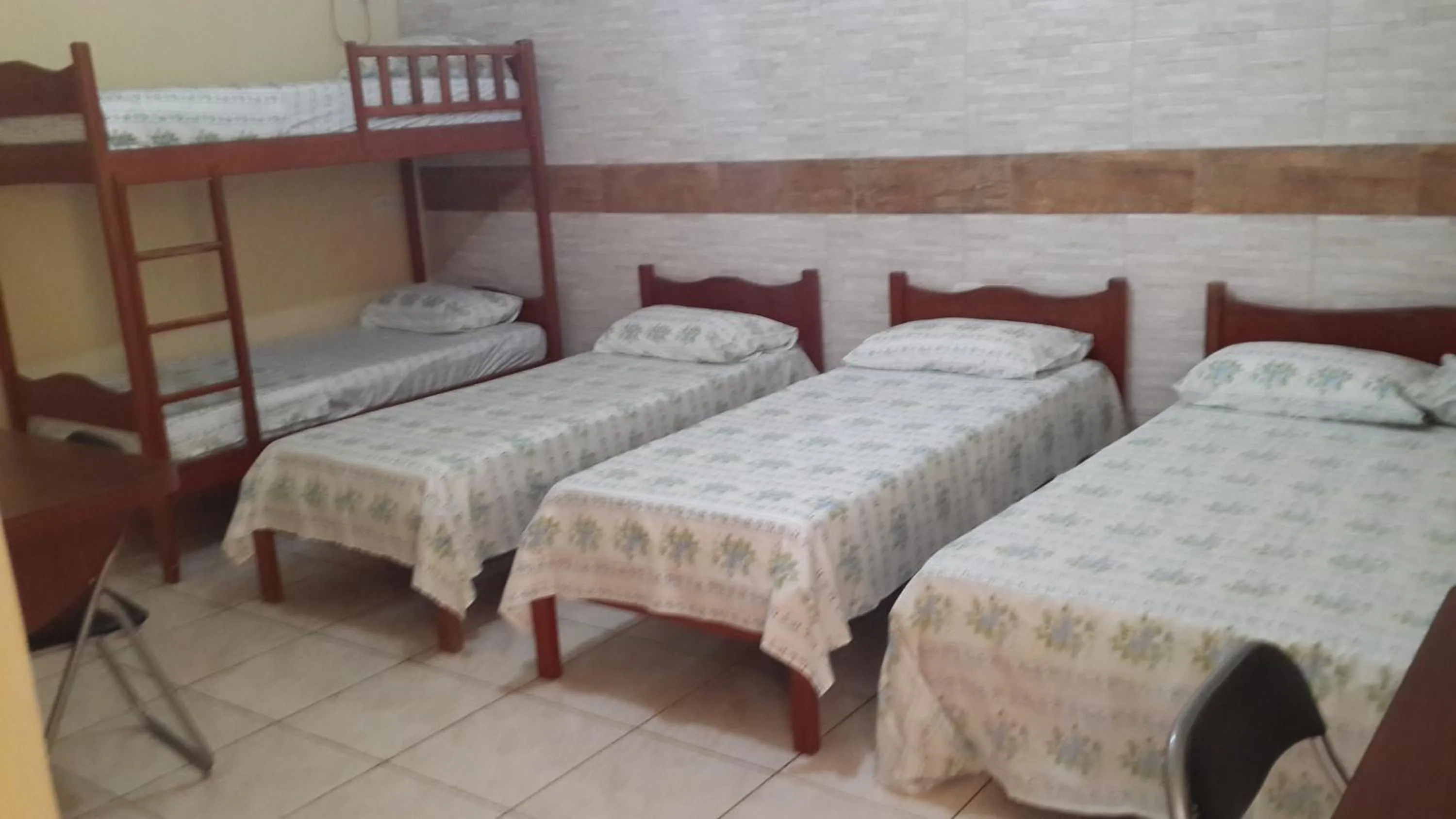 Bed in Pousada Paraiso