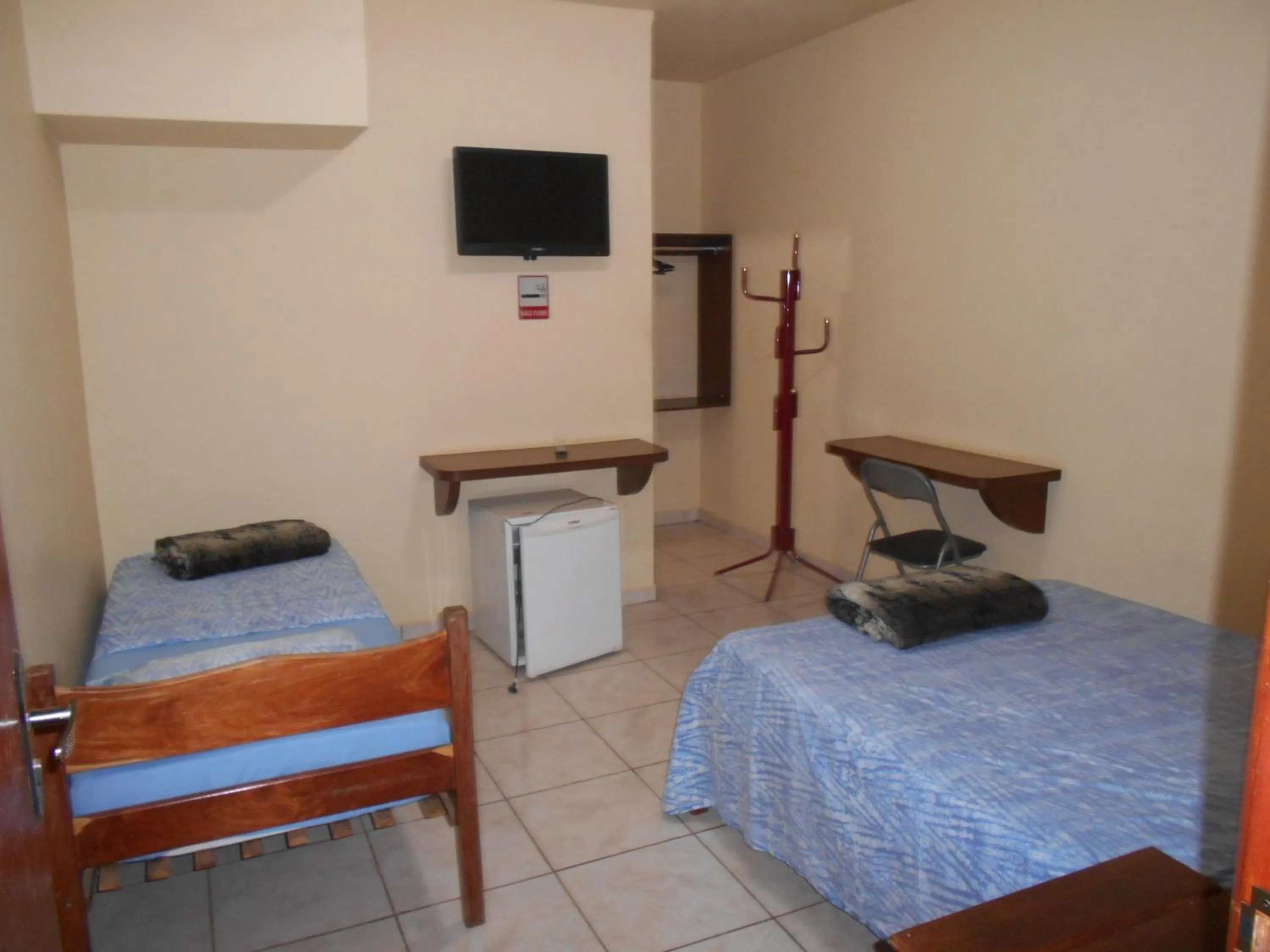 Bed in Pousada Paraiso