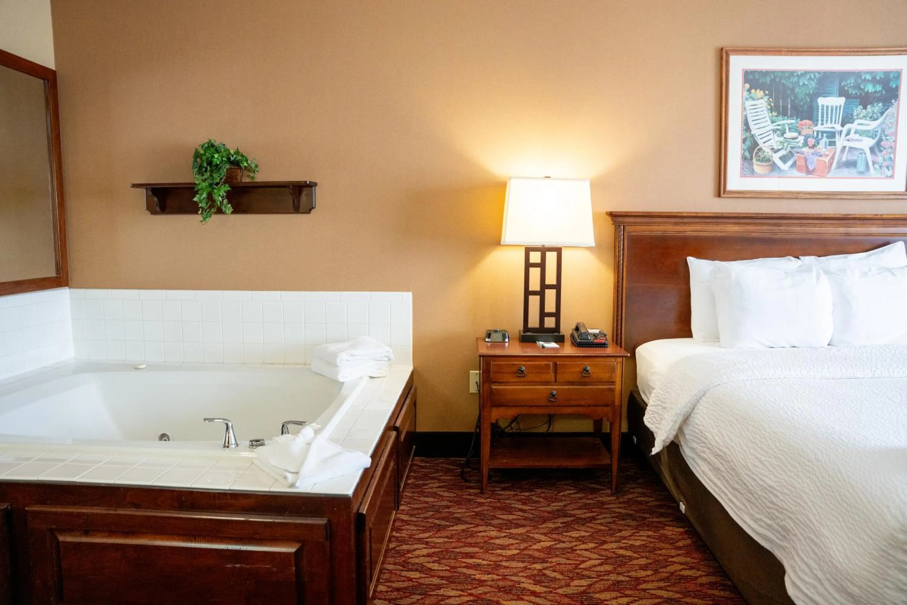 Bed in Coshocton Village Inn & Suites