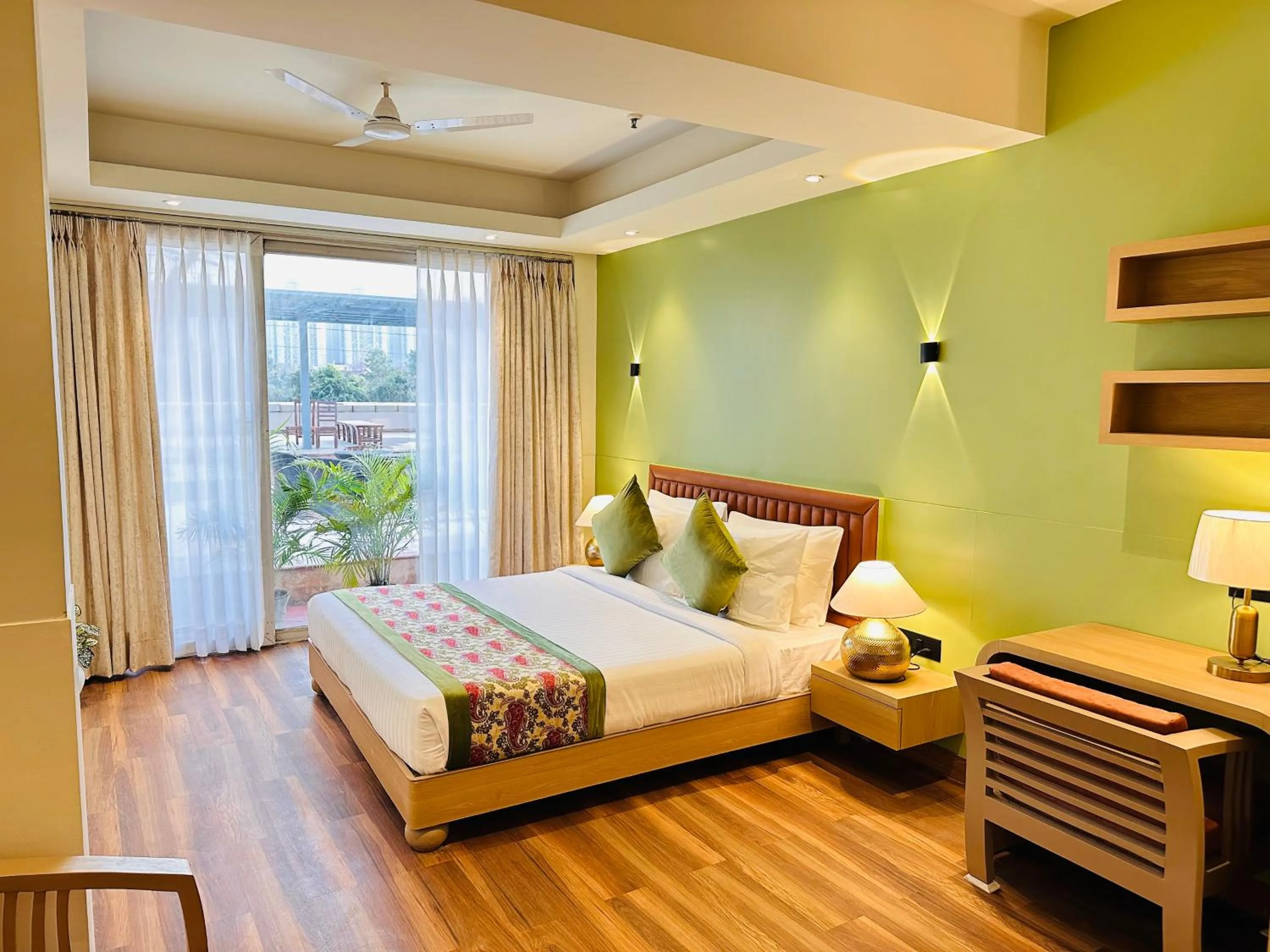 Living room, Bed in Hotel South Ex Residency - South Ex near AIIMS Delhi - Couple Friendly