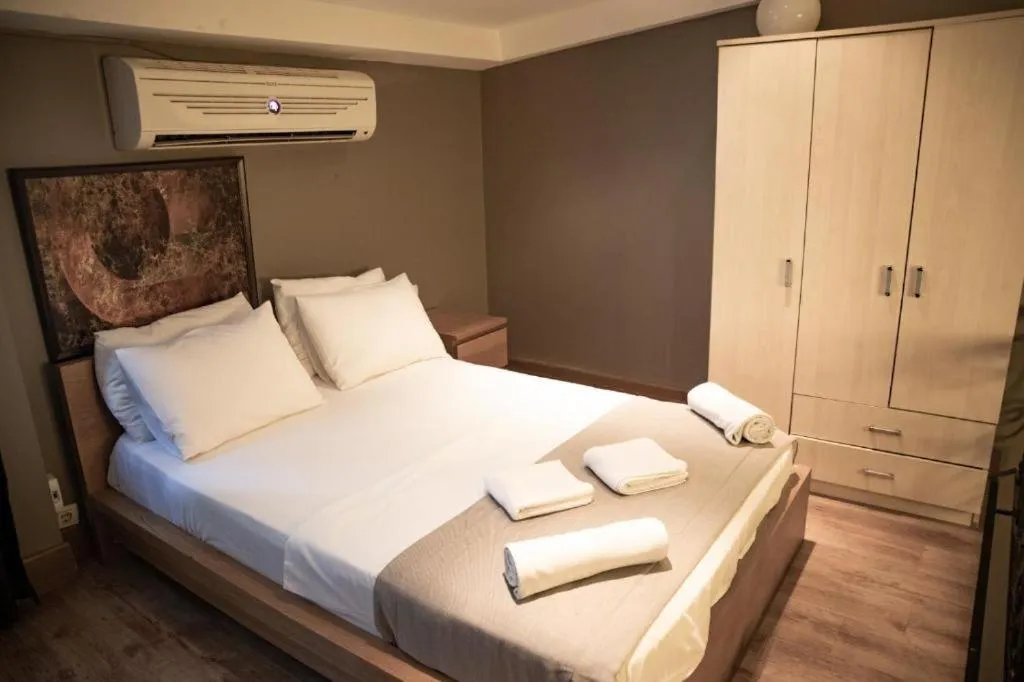 Bed in The Hera Hotels