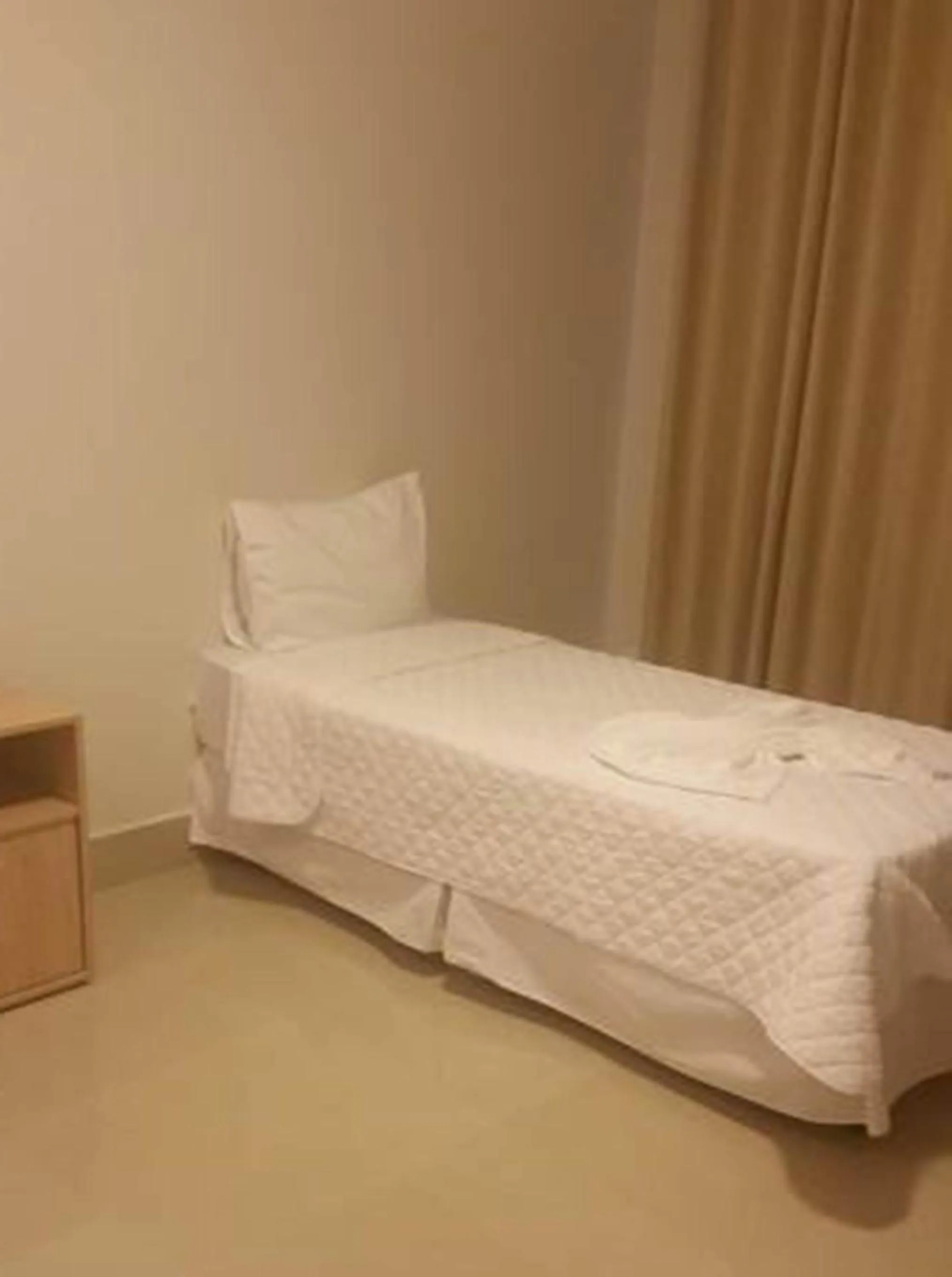 Bed in Kamur Plaza Hotel