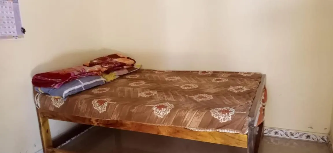 Bed in Om Laxmi Narayan Homestay