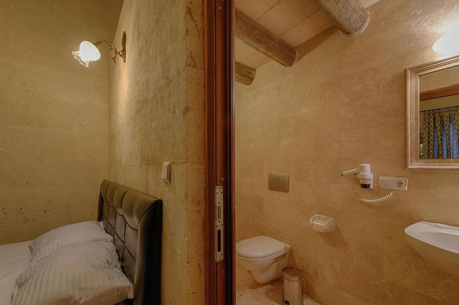 Bed in Avlu Cave House