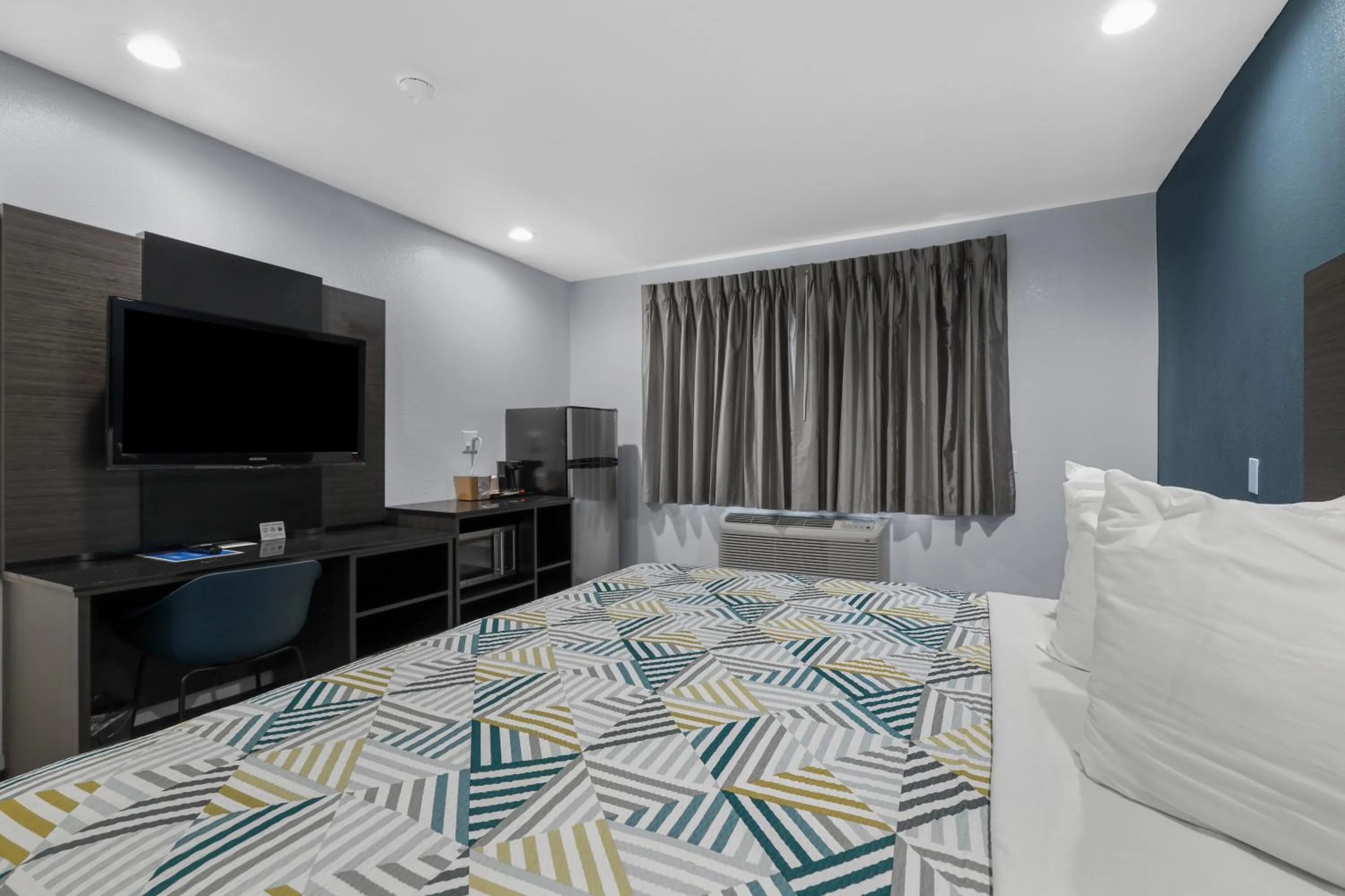 Bed in Studio 6 Suites Perris, CA