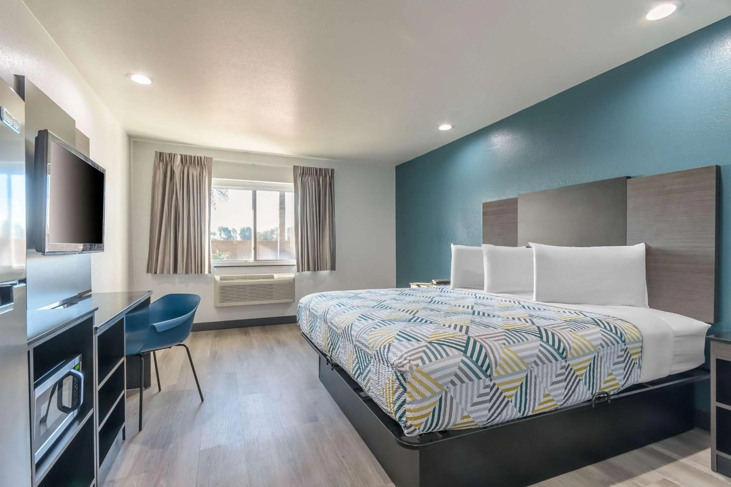 Bedroom, Bed in Studio 6 Suites Perris, CA