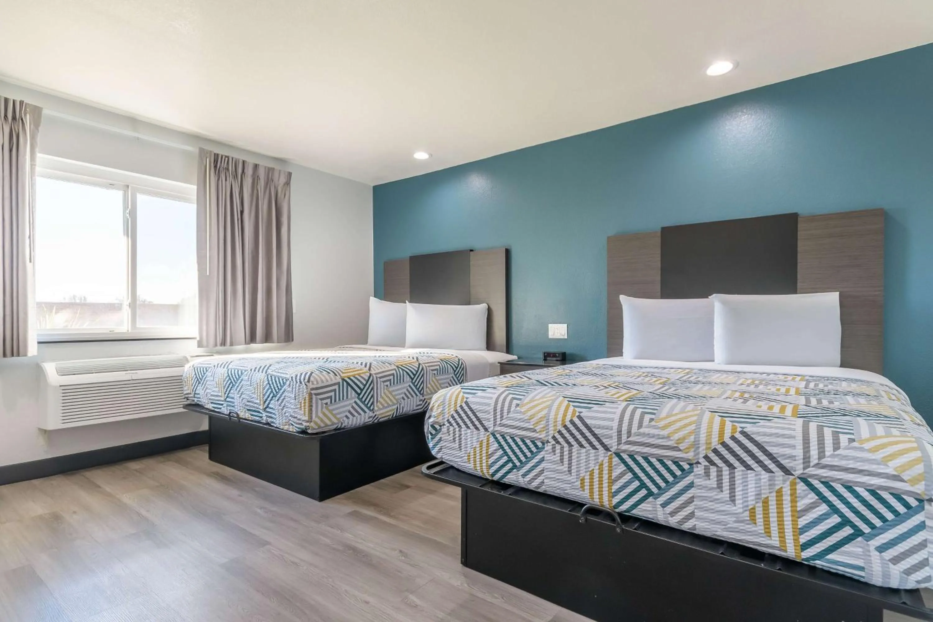 Bedroom, Bed in Studio 6 Suites Perris, CA