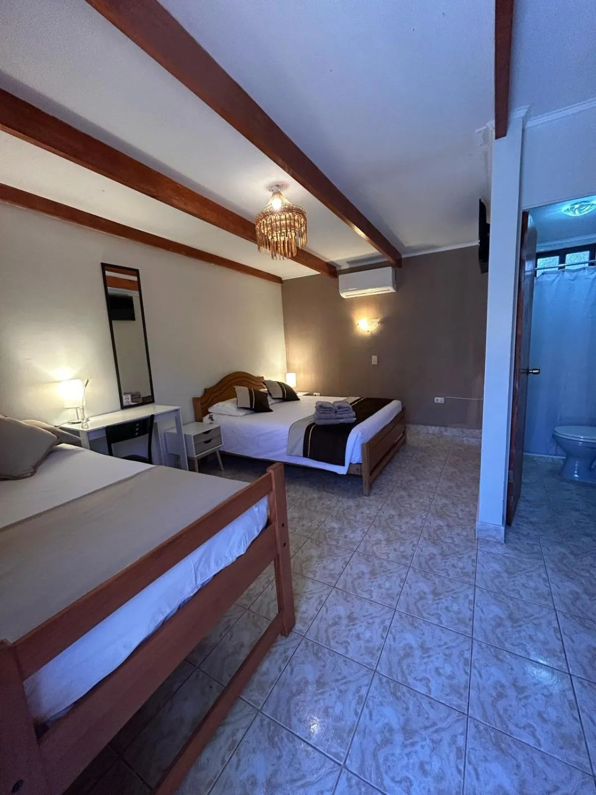 Photo of the whole room, Bed in Hostal Katarpe