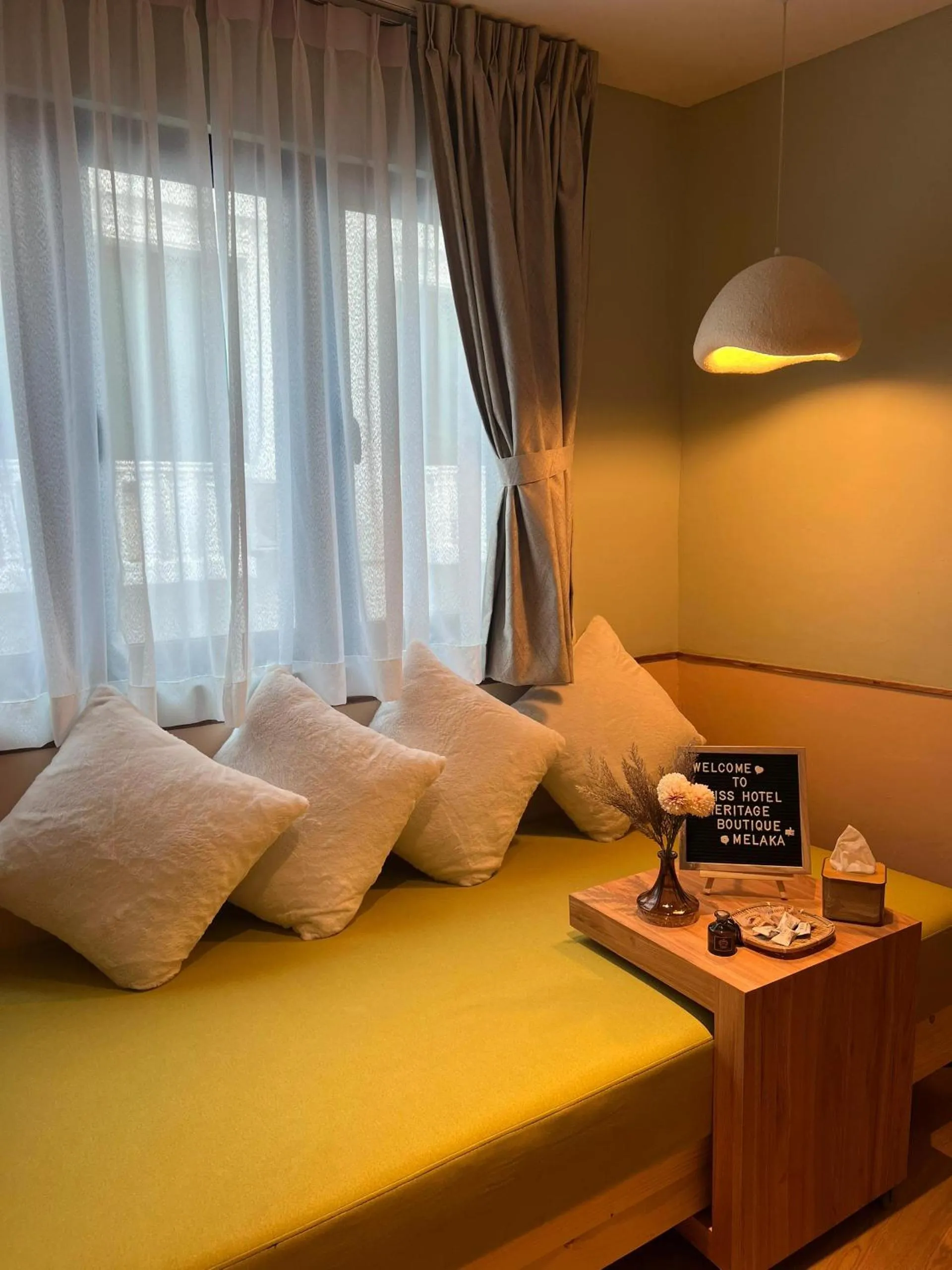 Seating area, Bed in Swiss Hotel Heritage Boutique Melaka