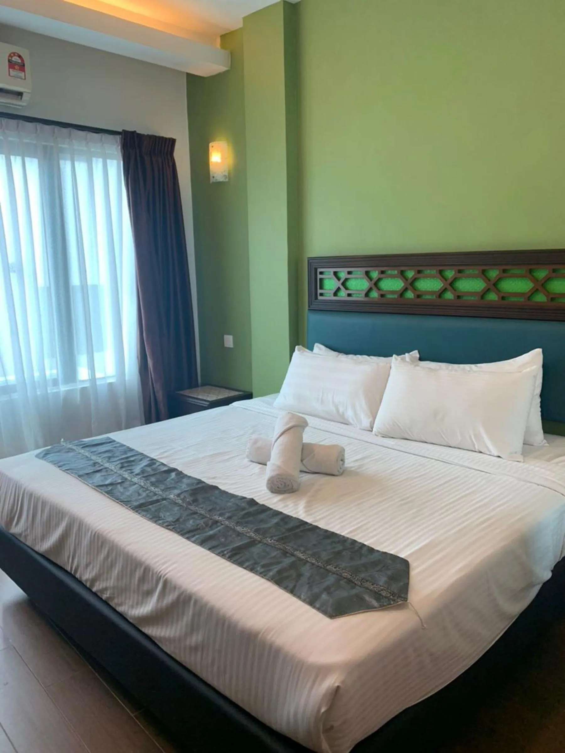 Bed in Swiss Hotel Heritage Boutique Melaka