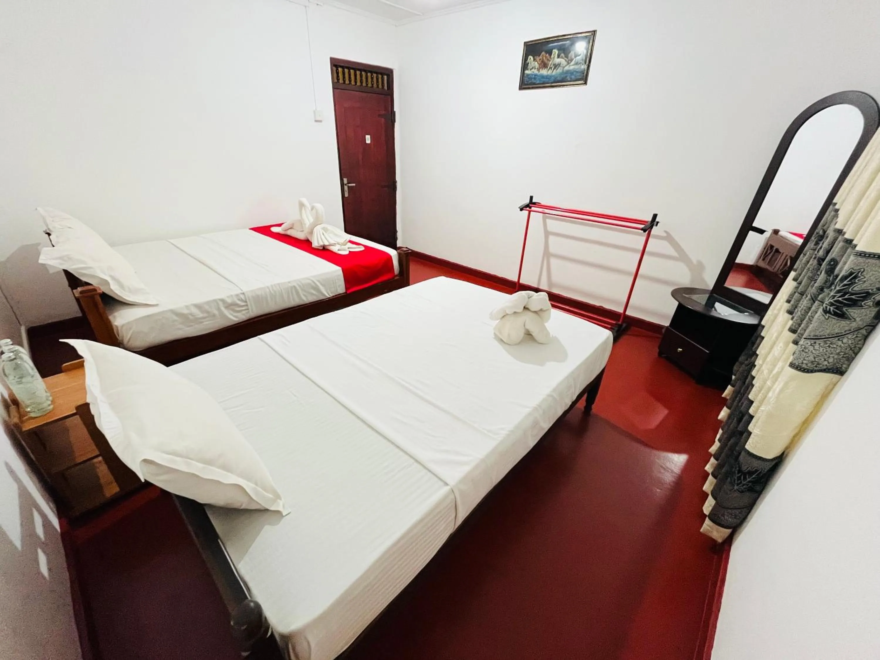 Bed in Palitha Homestay