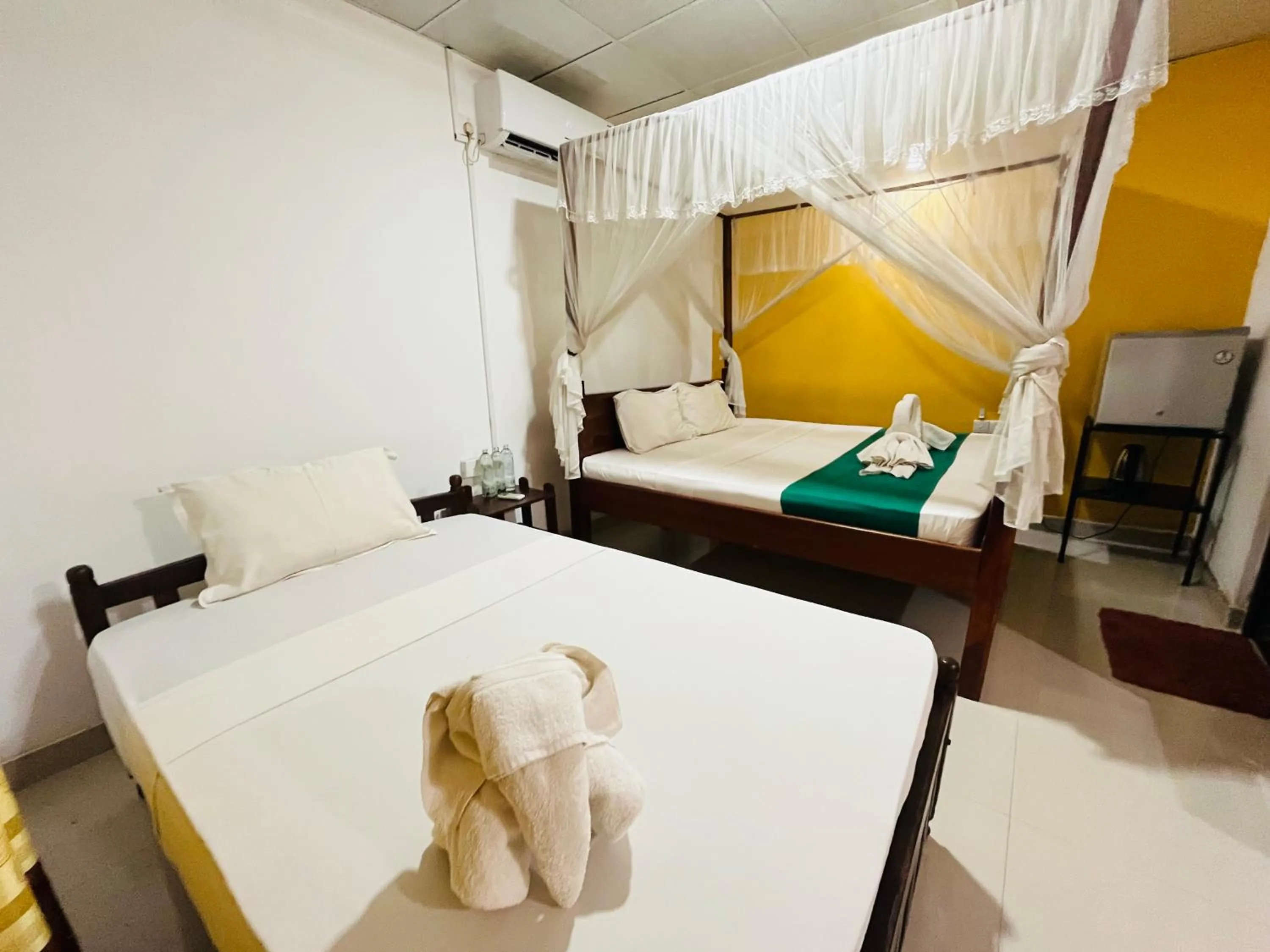 Bed in Palitha Homestay