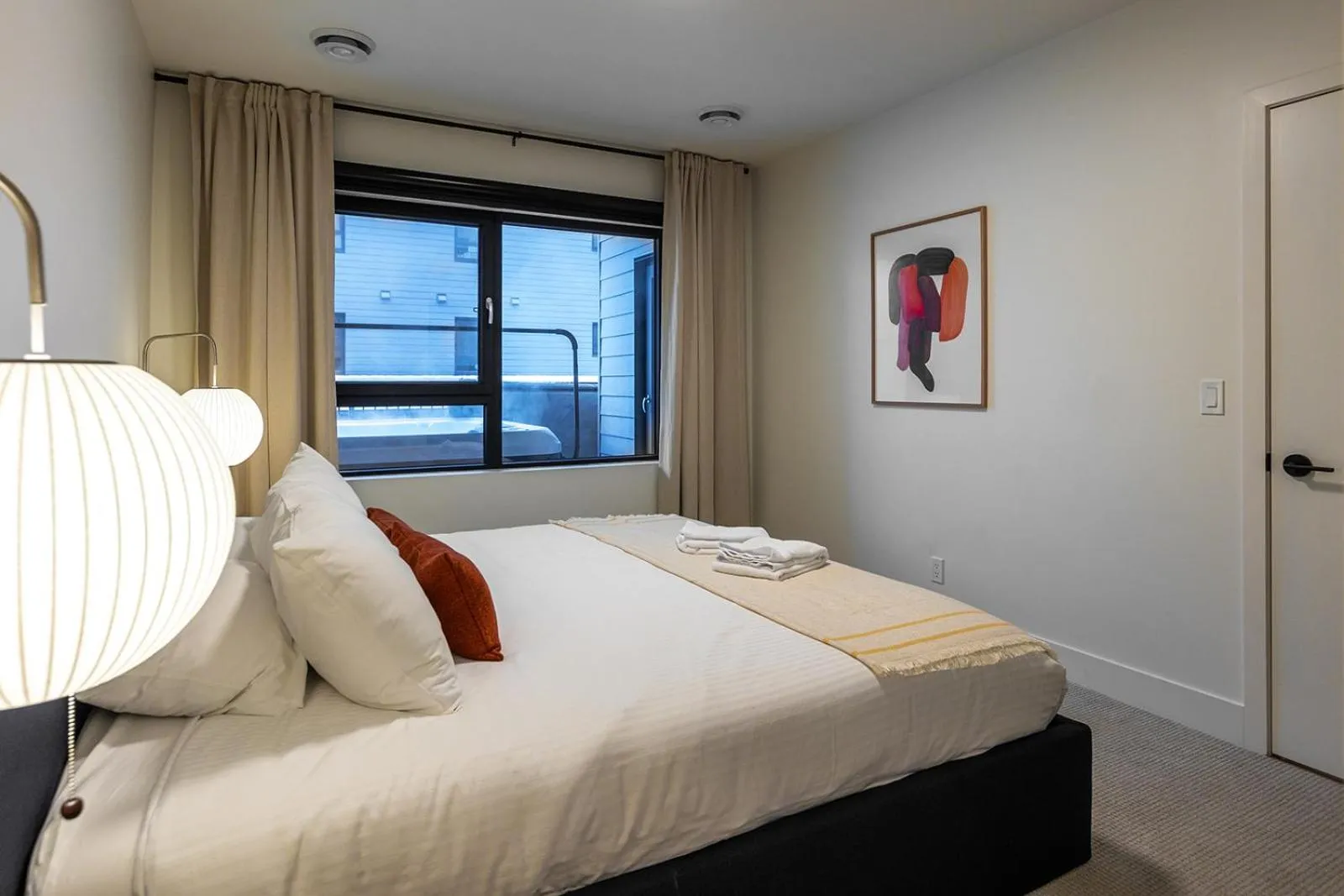 Bed in Tally Ho by Revelstoke Vacations